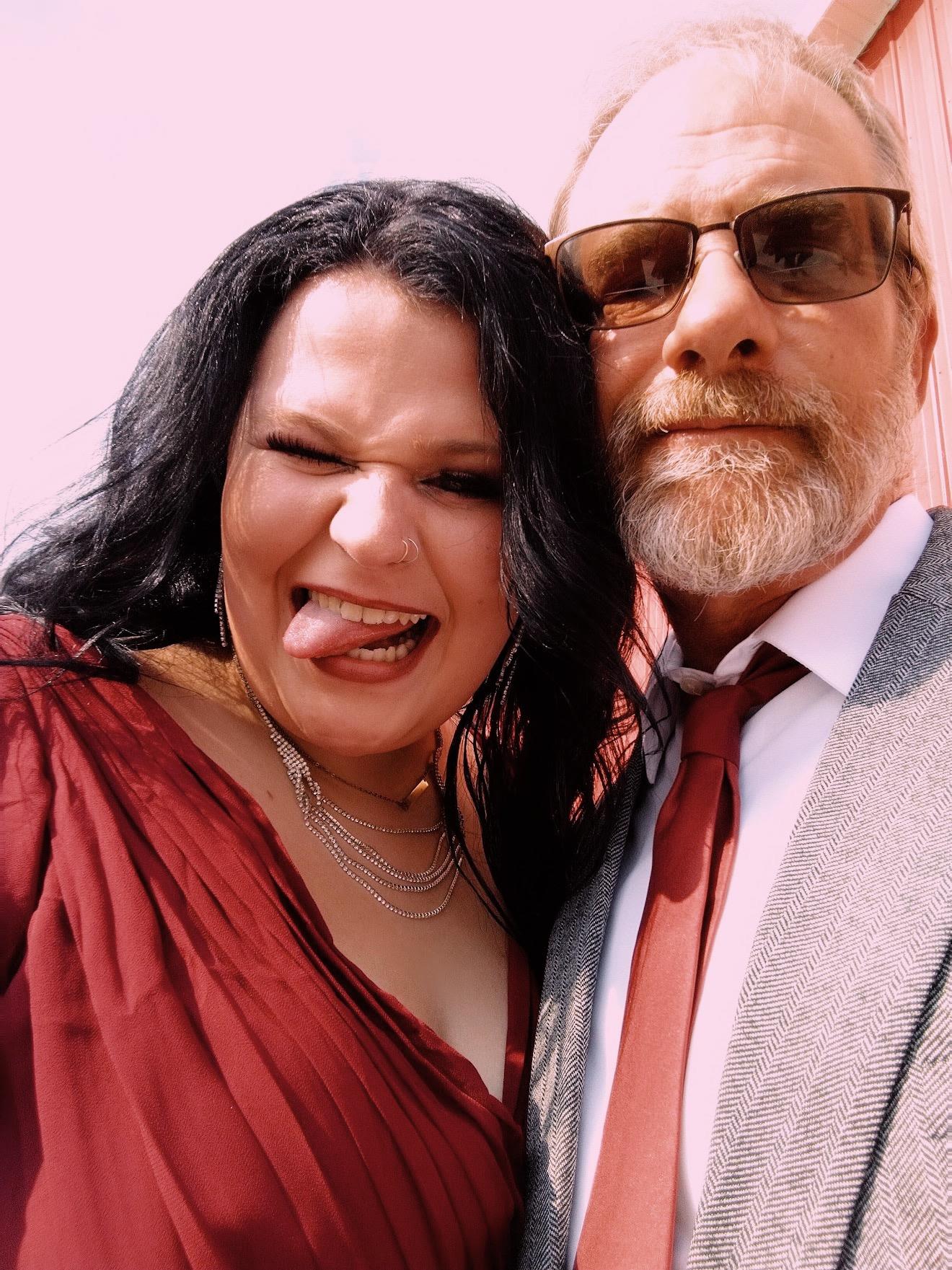 A man and woman taking a selfie