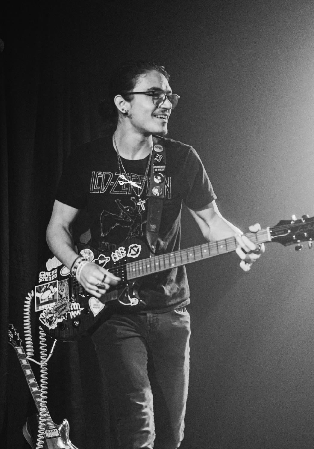 A man playing a guitar