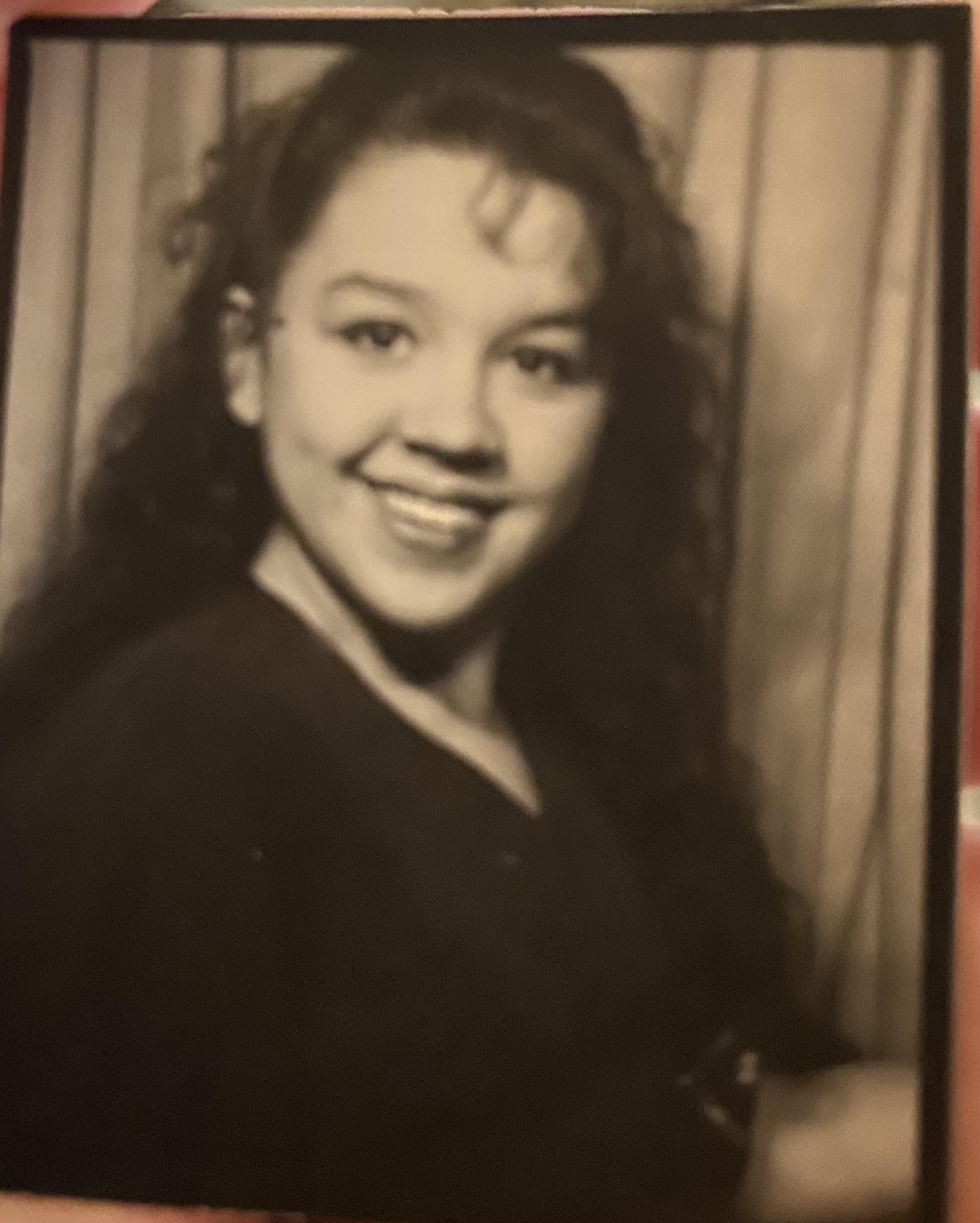 A woman smiling at the camera