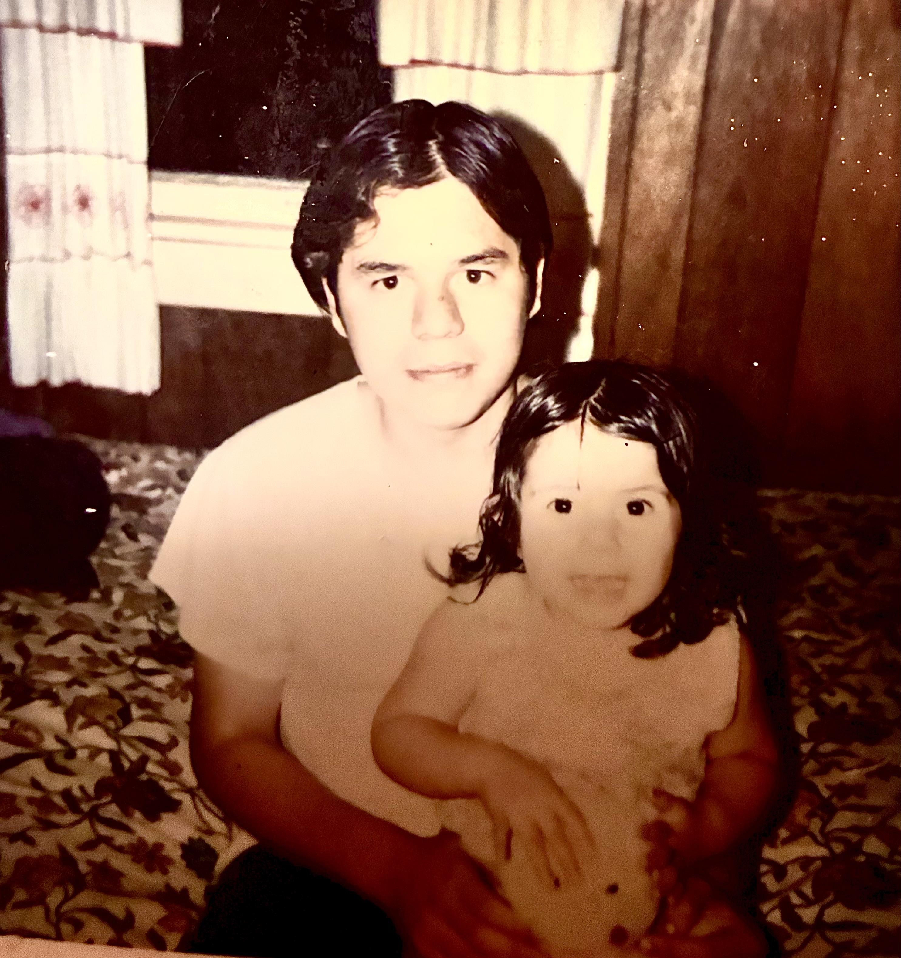 A man holding a baby