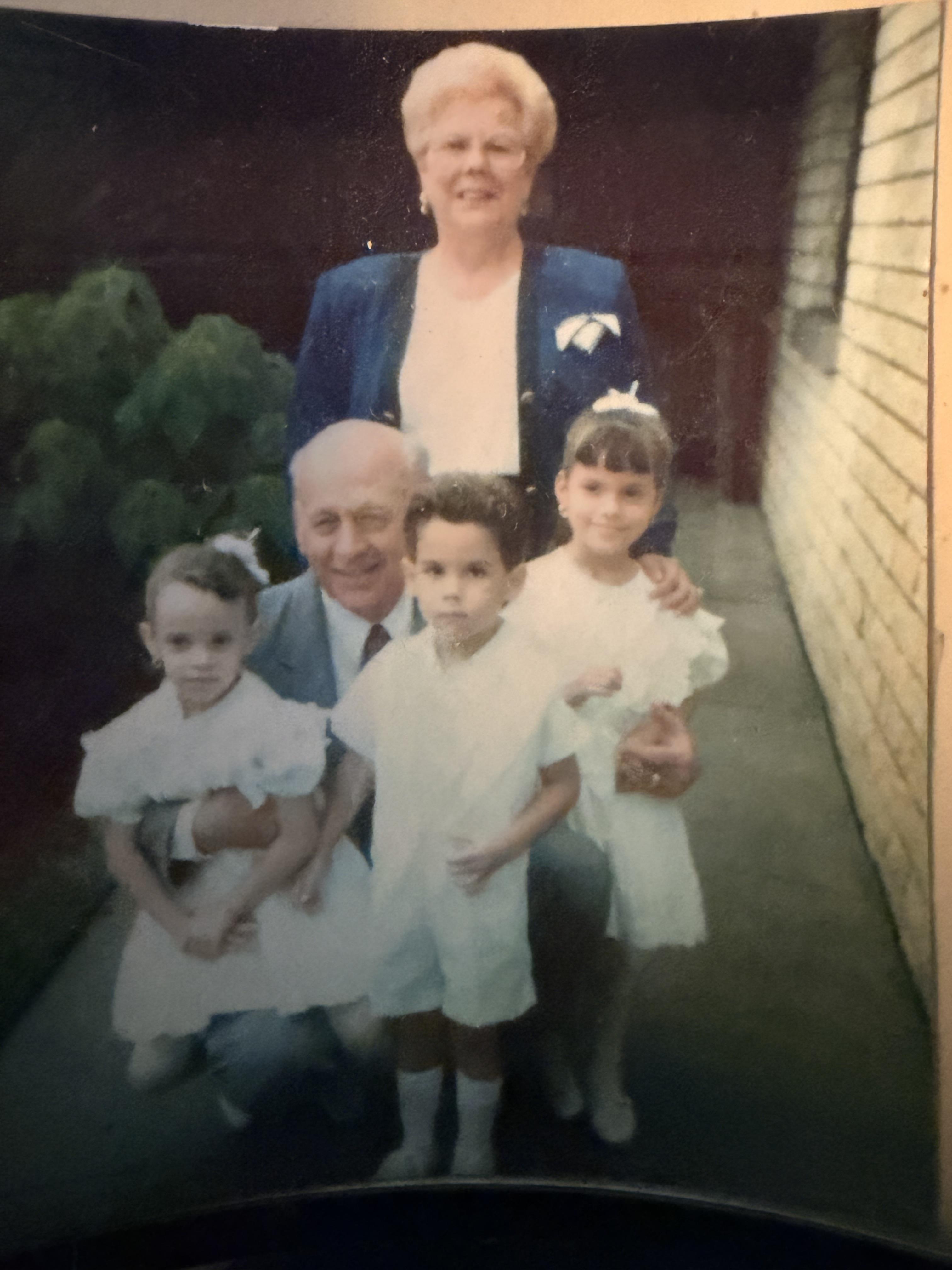 A man and woman posing for a picture