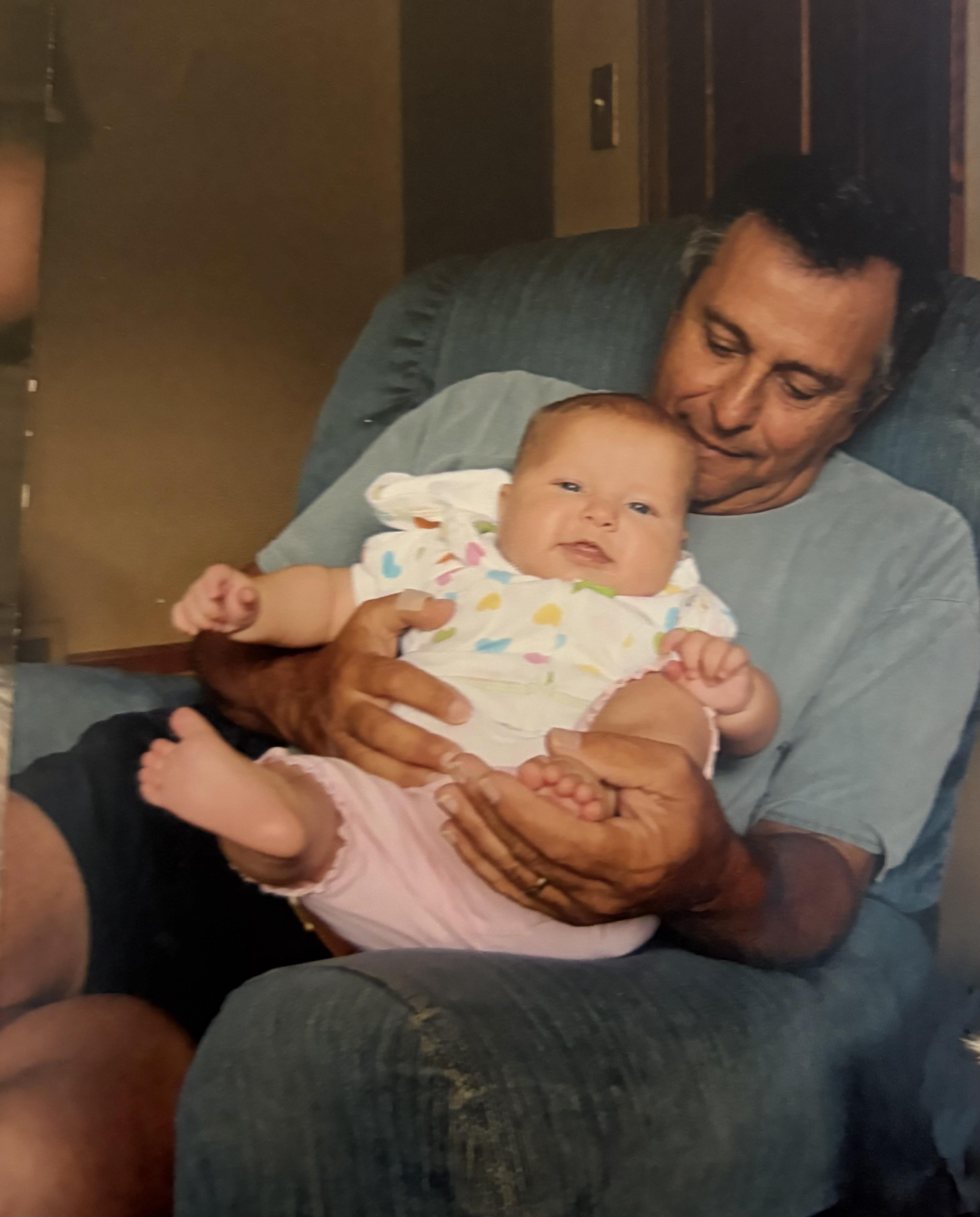 A man holding a baby