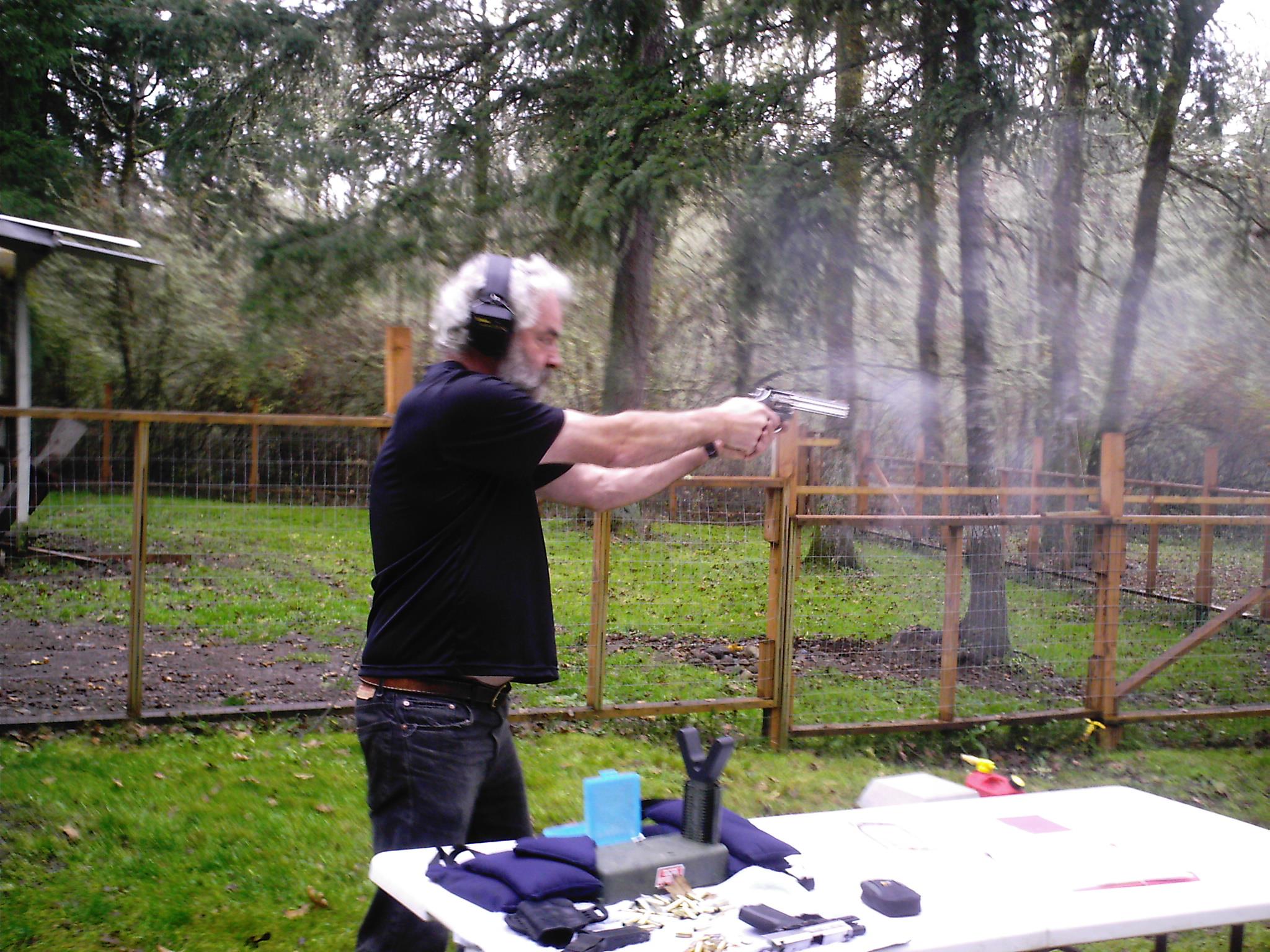 A man shooting a gun