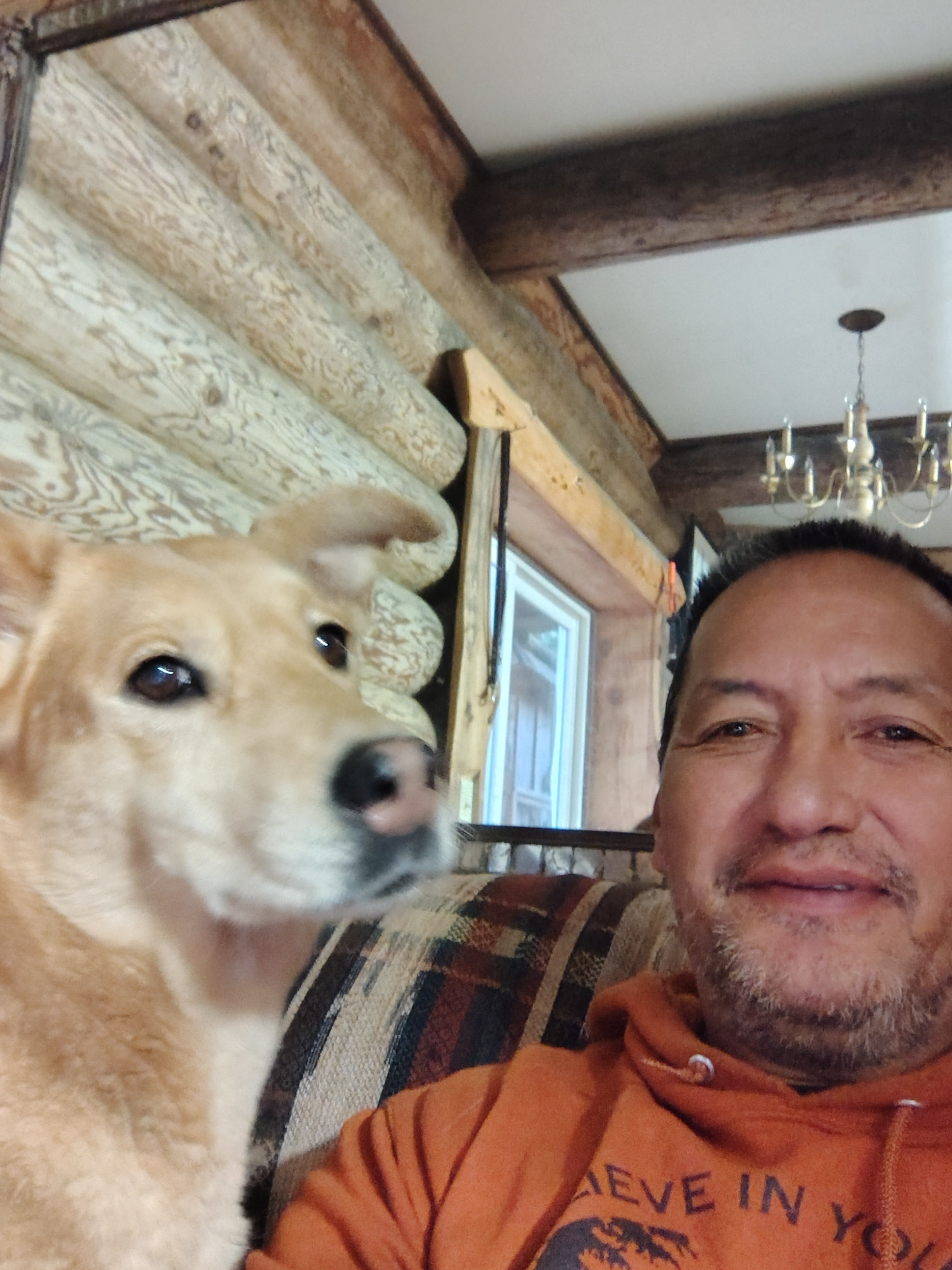 A man and dog taking a selfie
