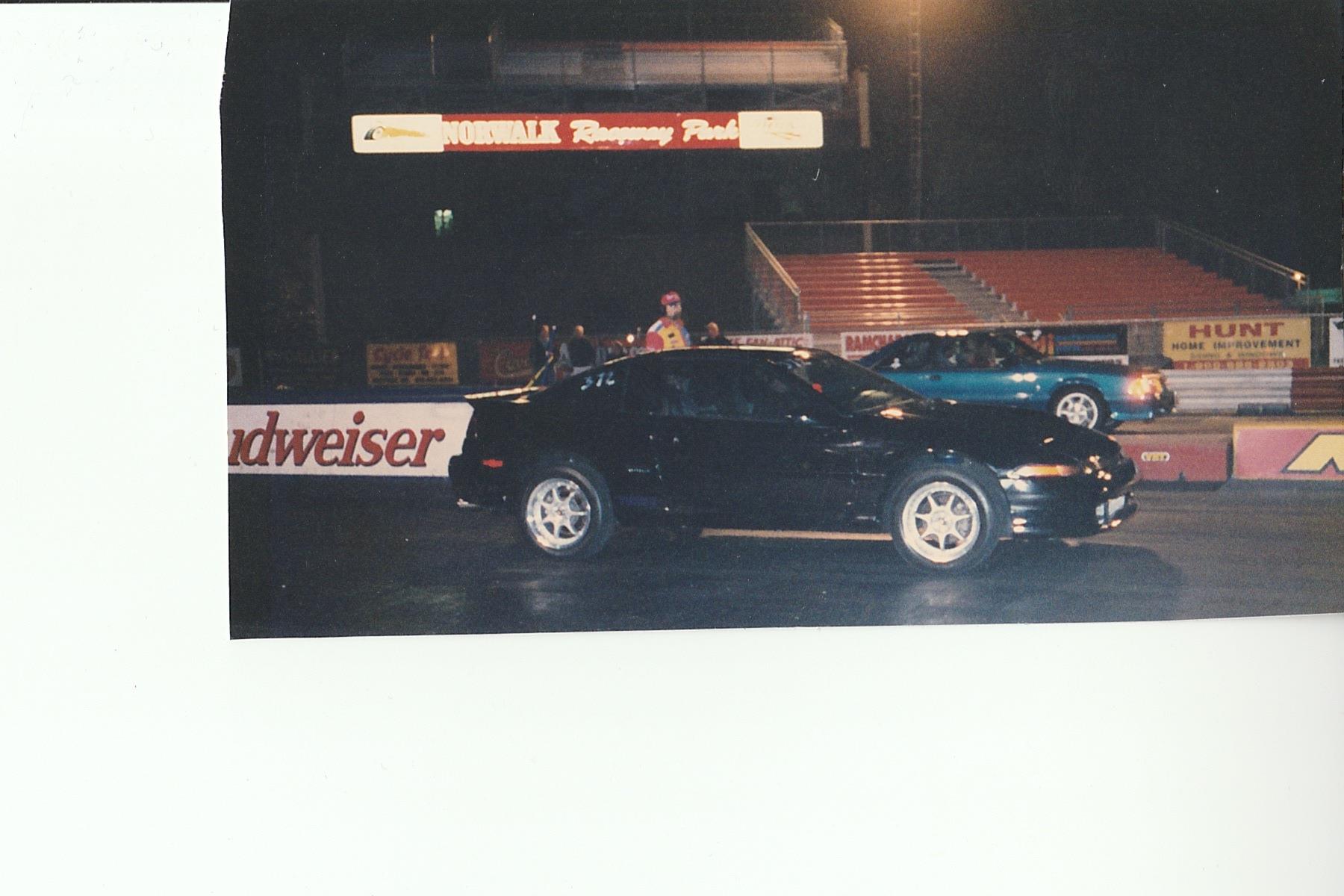 A black car parked on a track