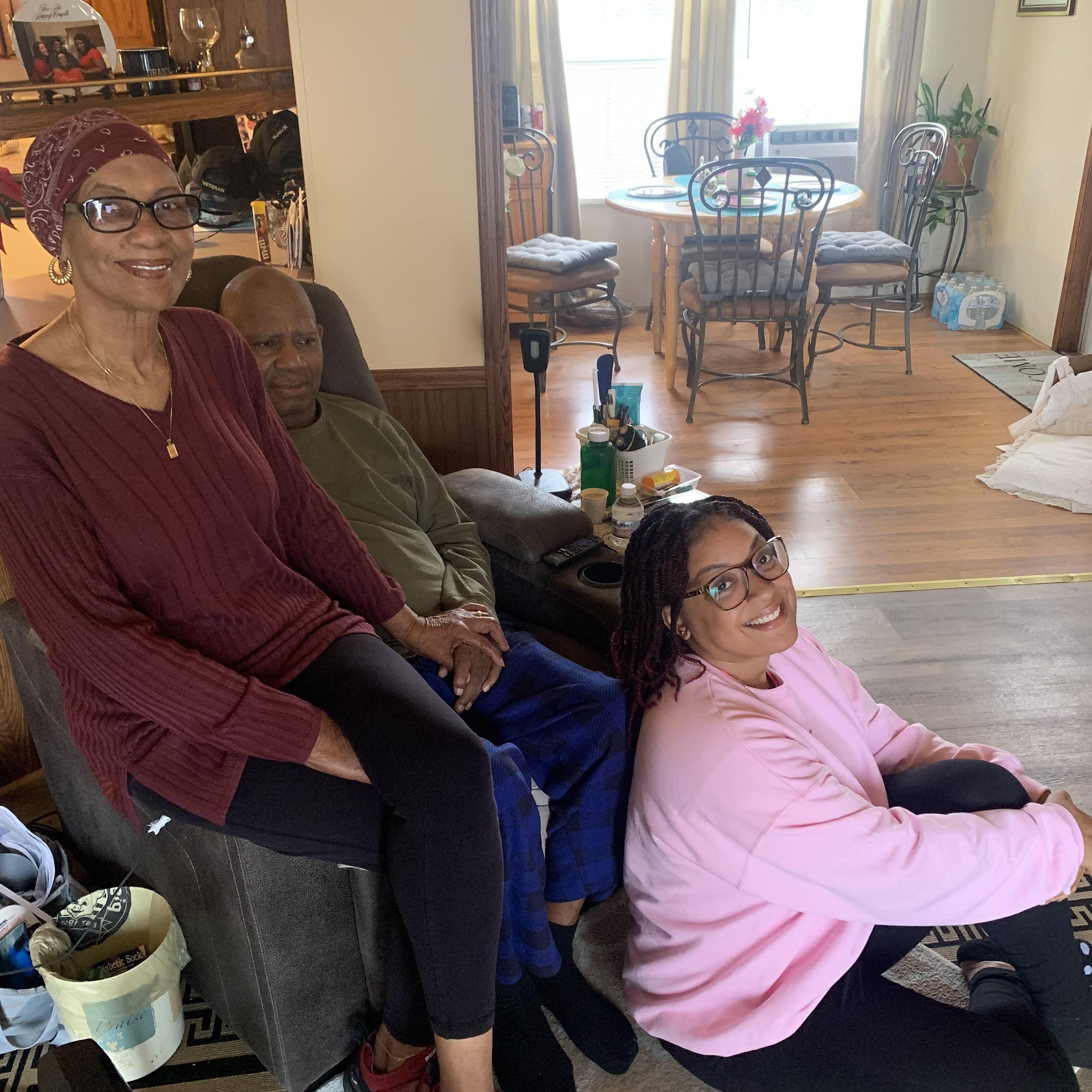 A group of people sitting on the floor