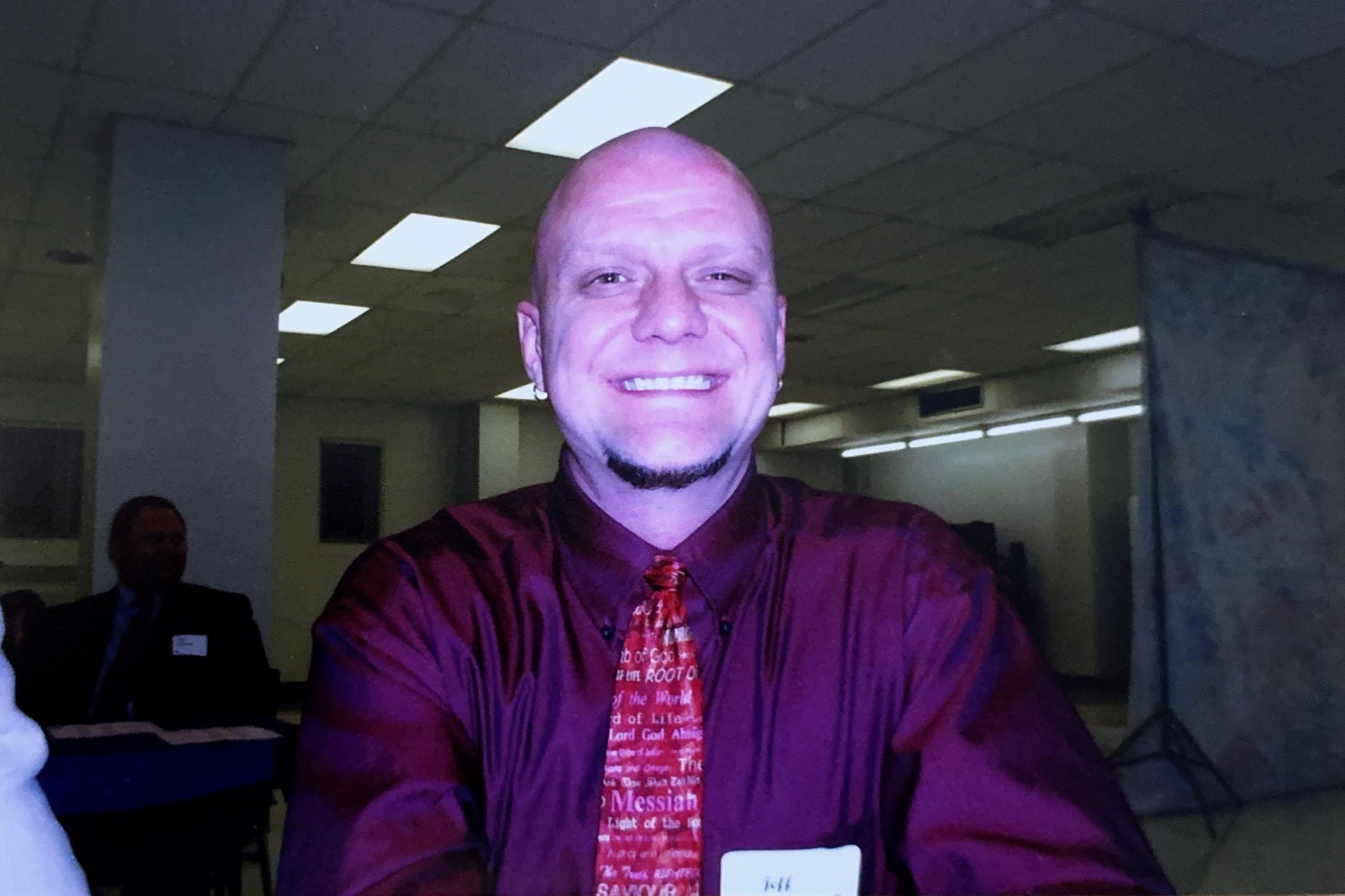 A man smiling at camera