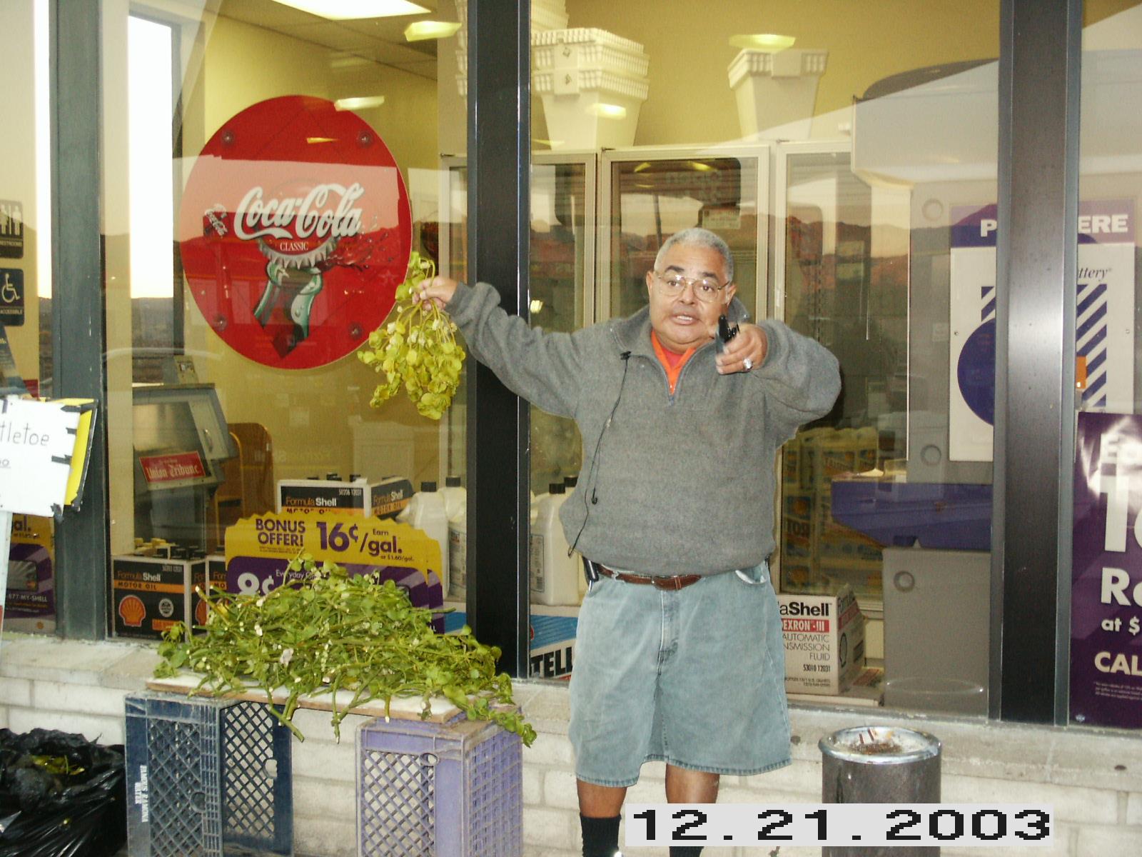 A man standing in front of a store