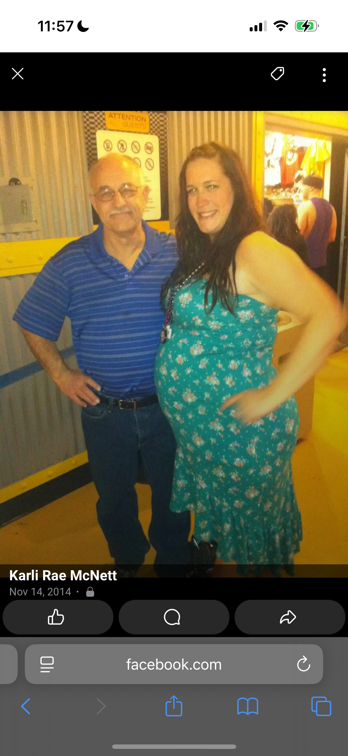 A man and woman posing for a picture