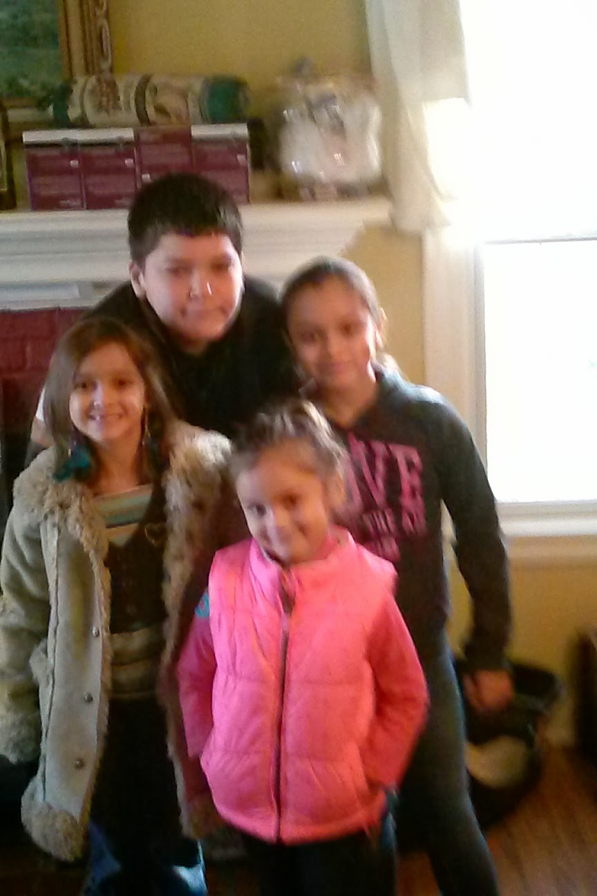 A group of children posing for a photo