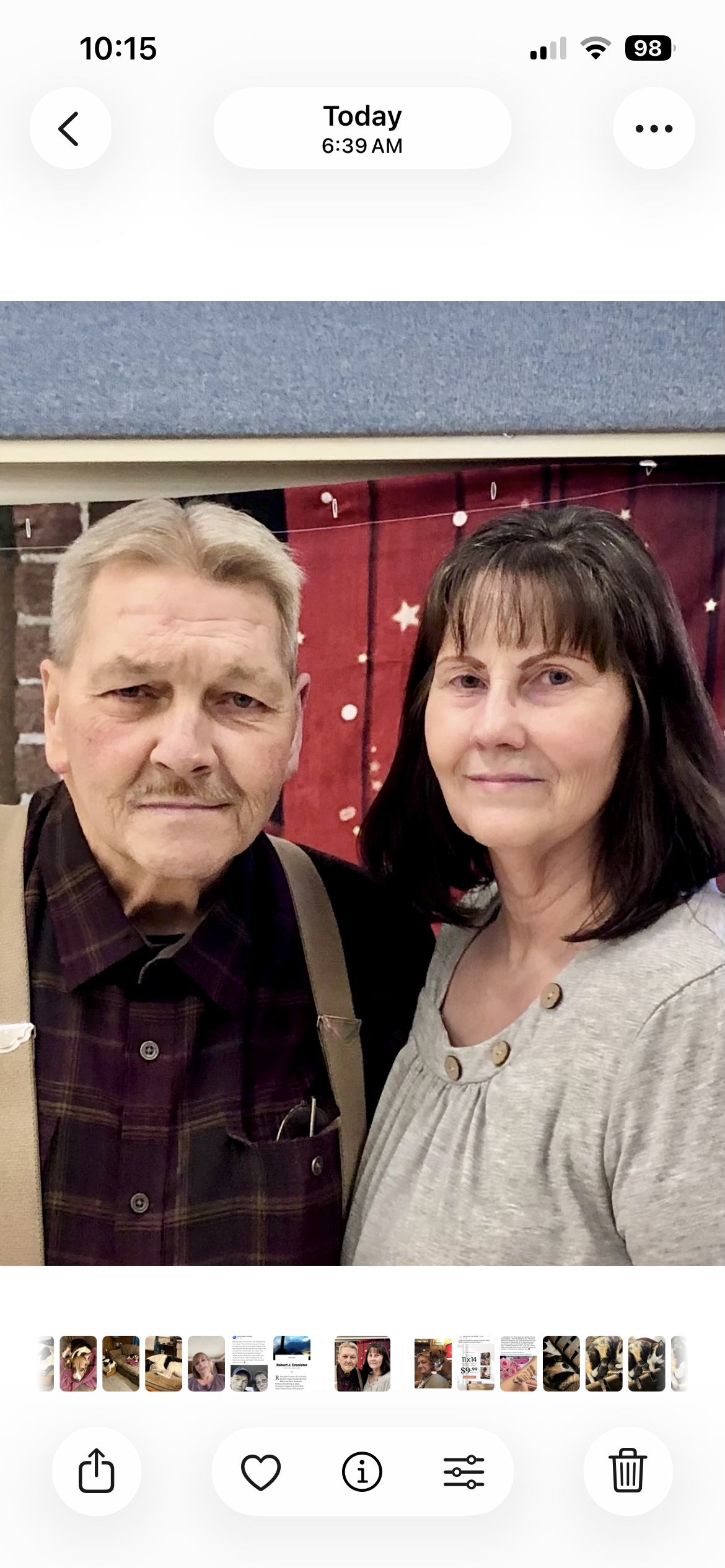 A man and woman posing for a picture