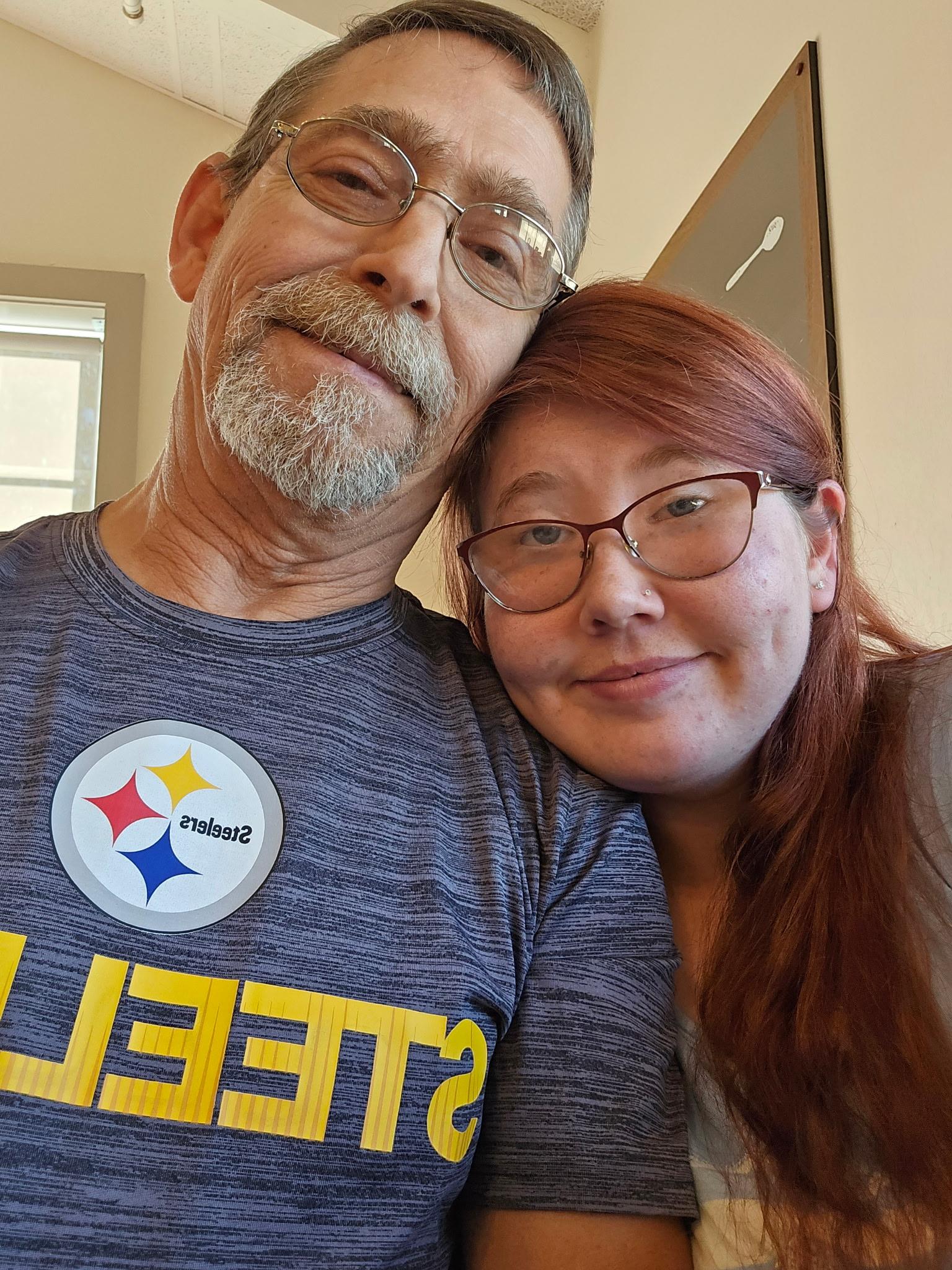 A man and woman taking a selfie