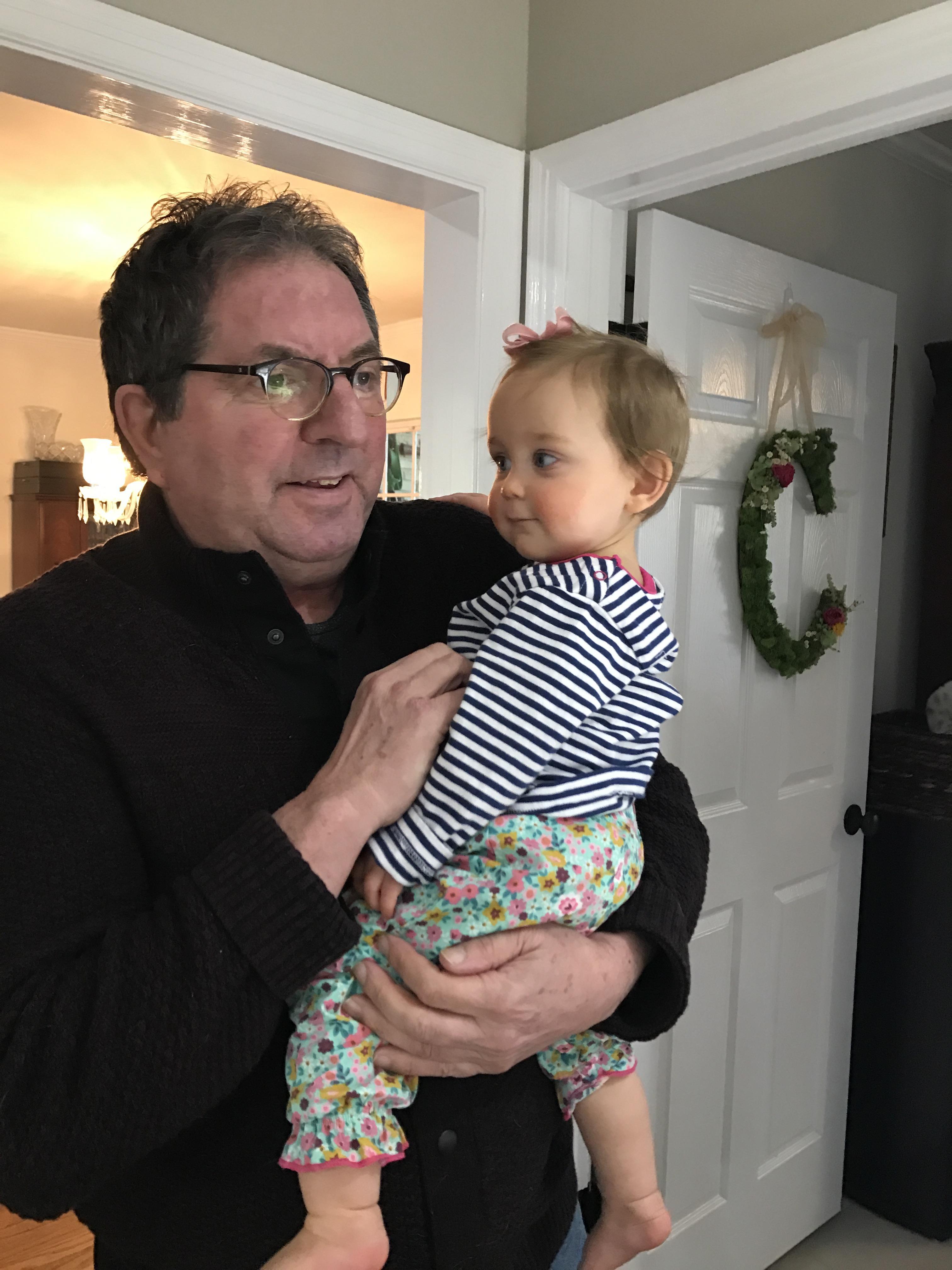 A man holding a baby