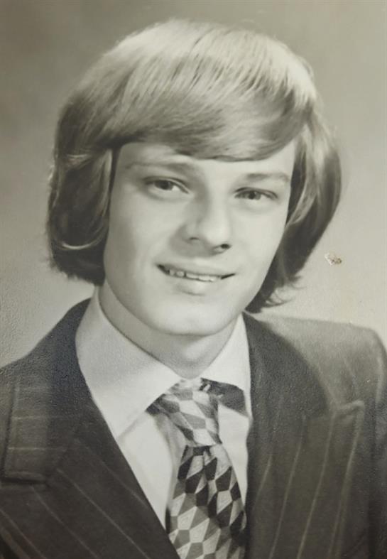 A man in a suit and tie