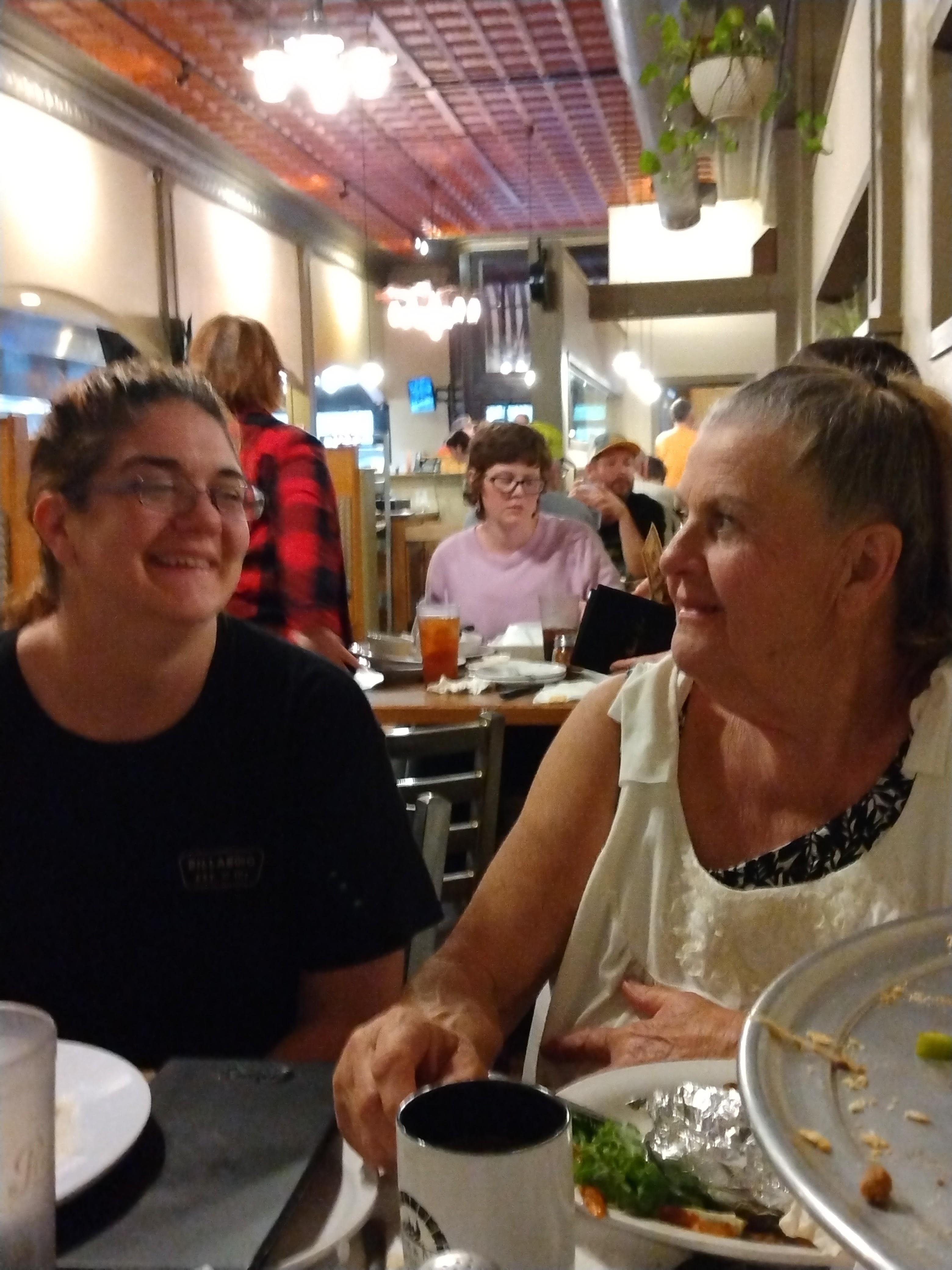 A group of people sitting at a table