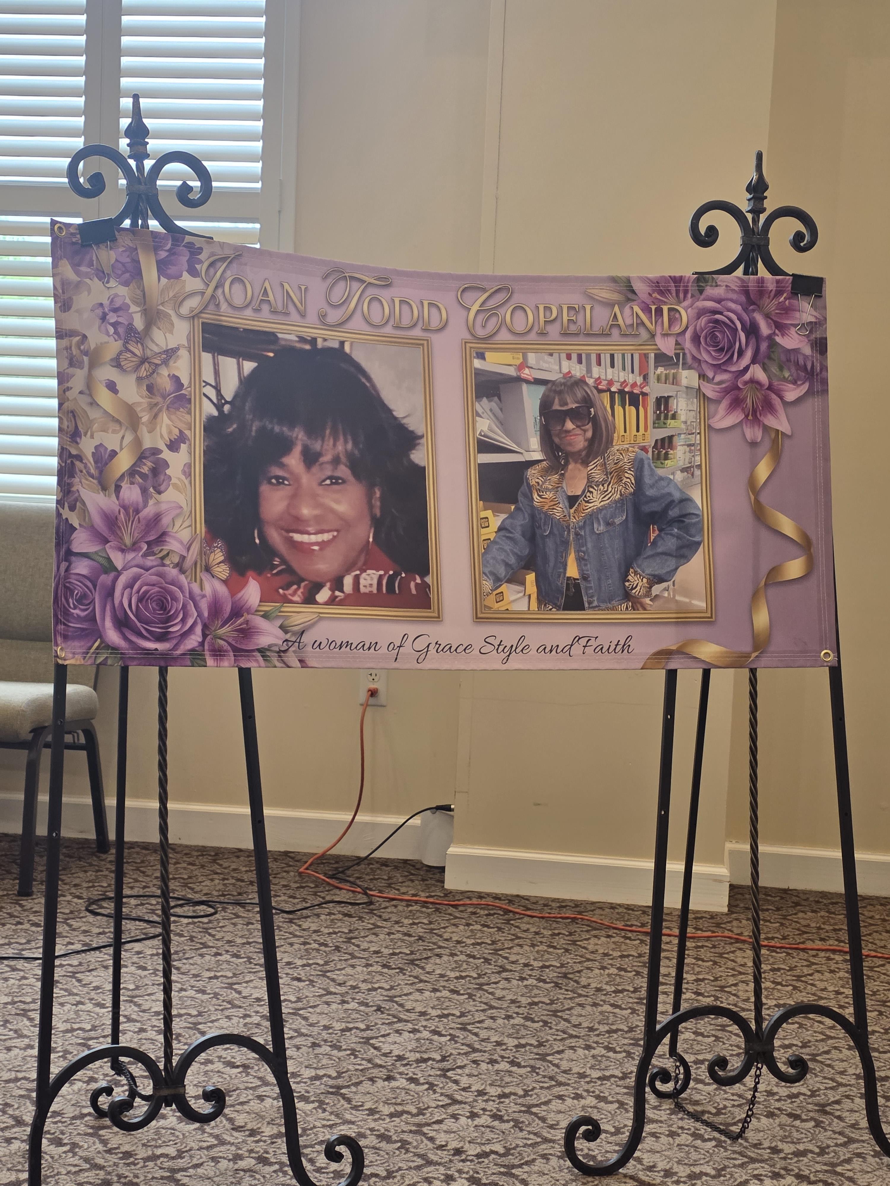 A sign with a picture of a woman and a woman