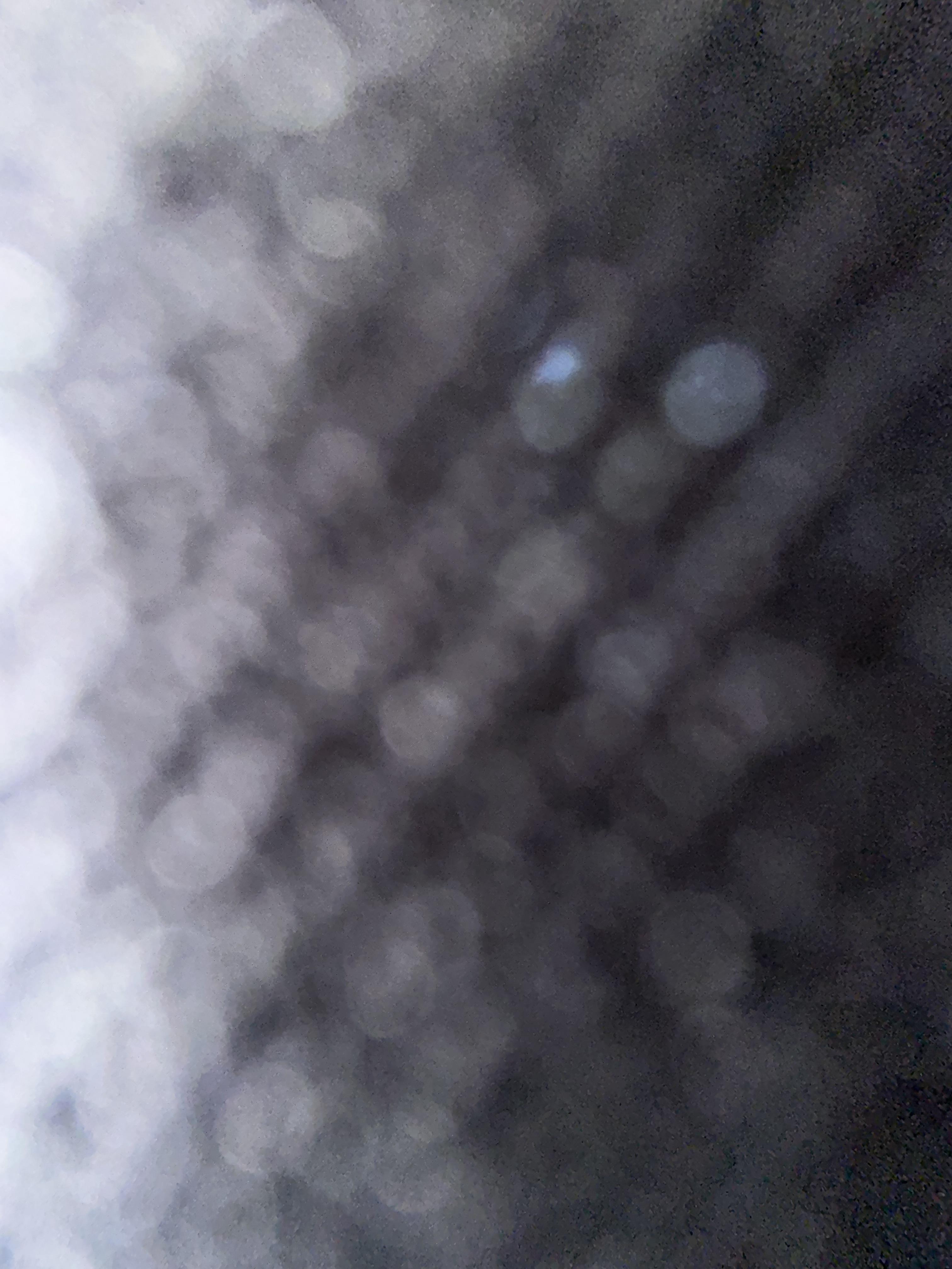 A blurry image of a black and white background