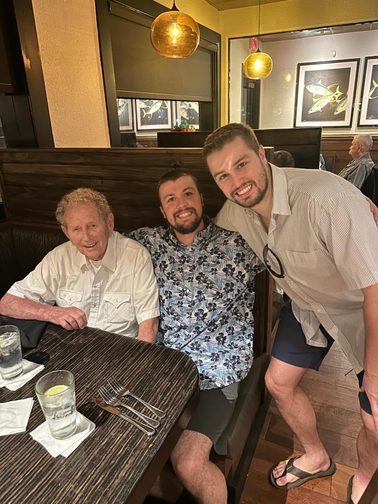 A group of men sitting at a table