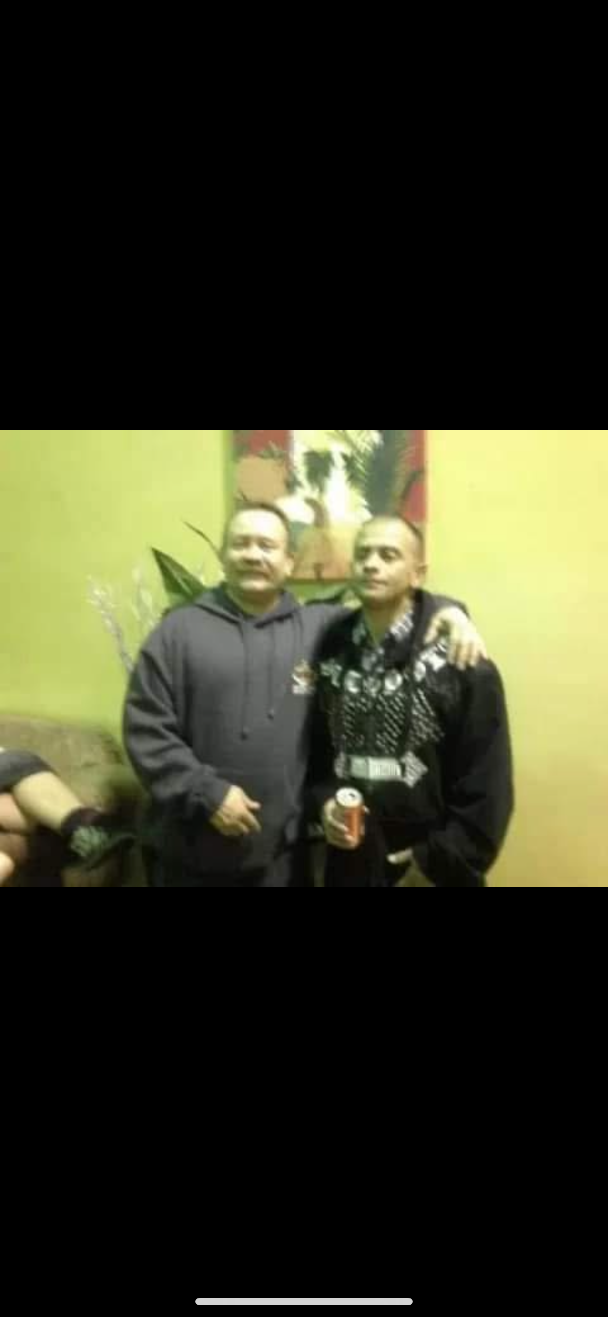 Two men standing together