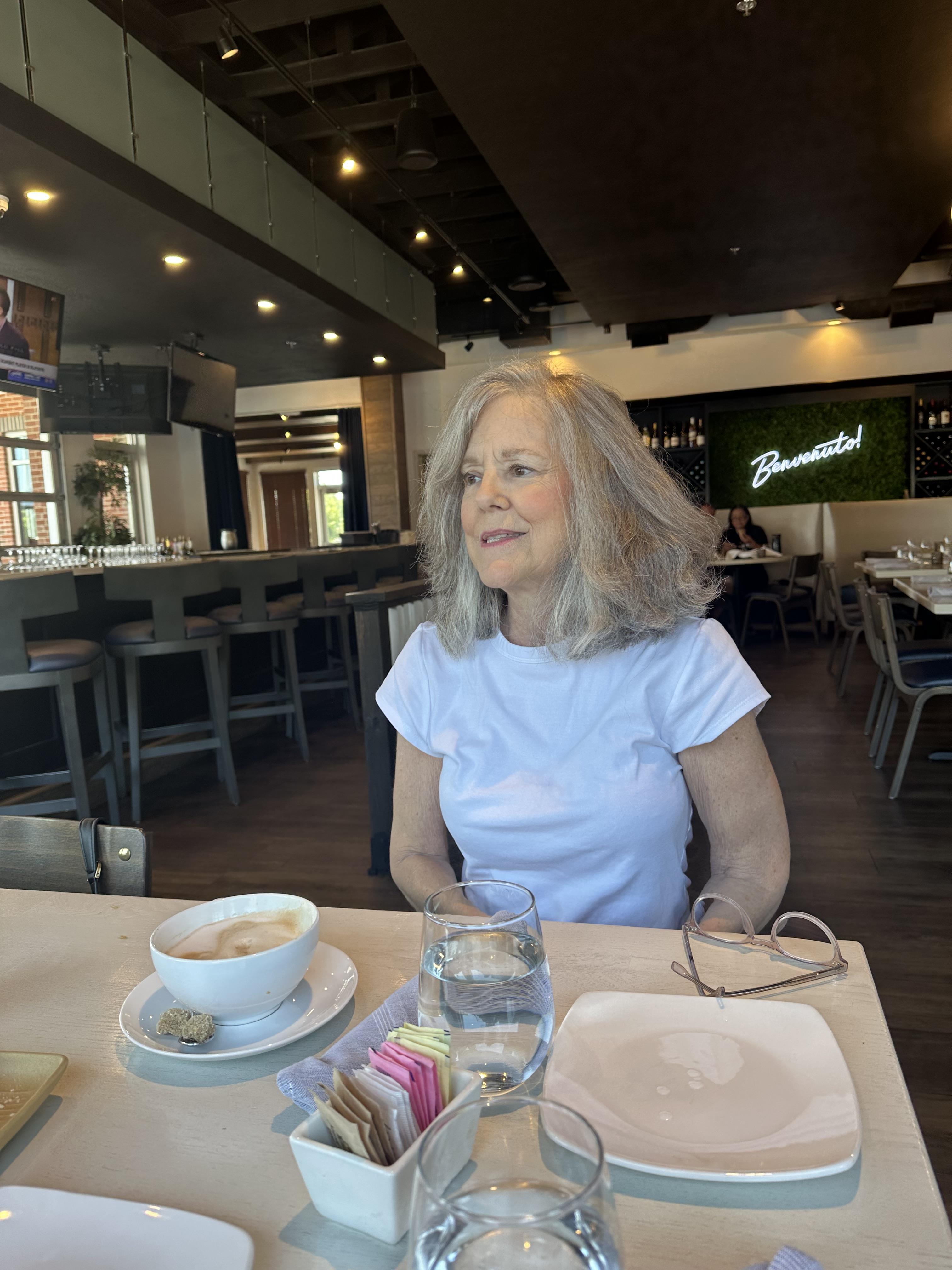 A woman sitting at a table