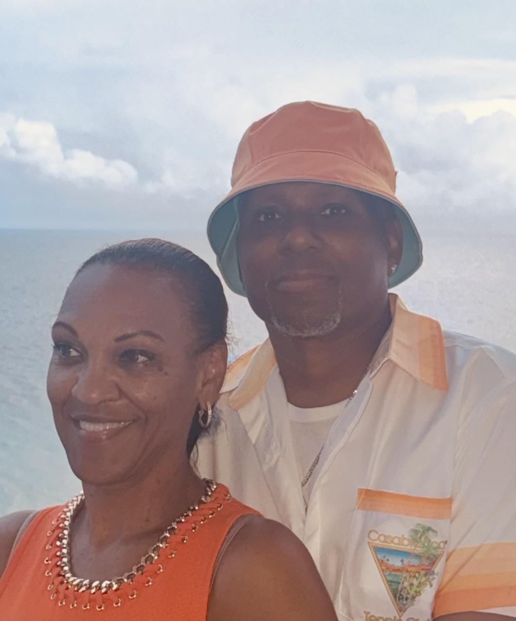 A man and woman posing for a picture