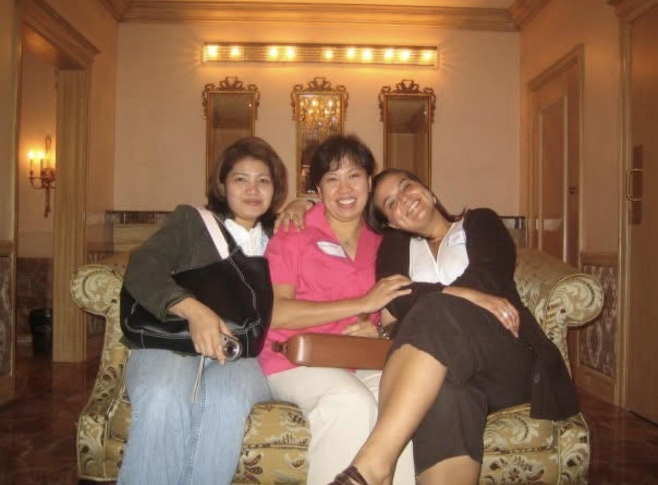 A group of women sitting on a couch