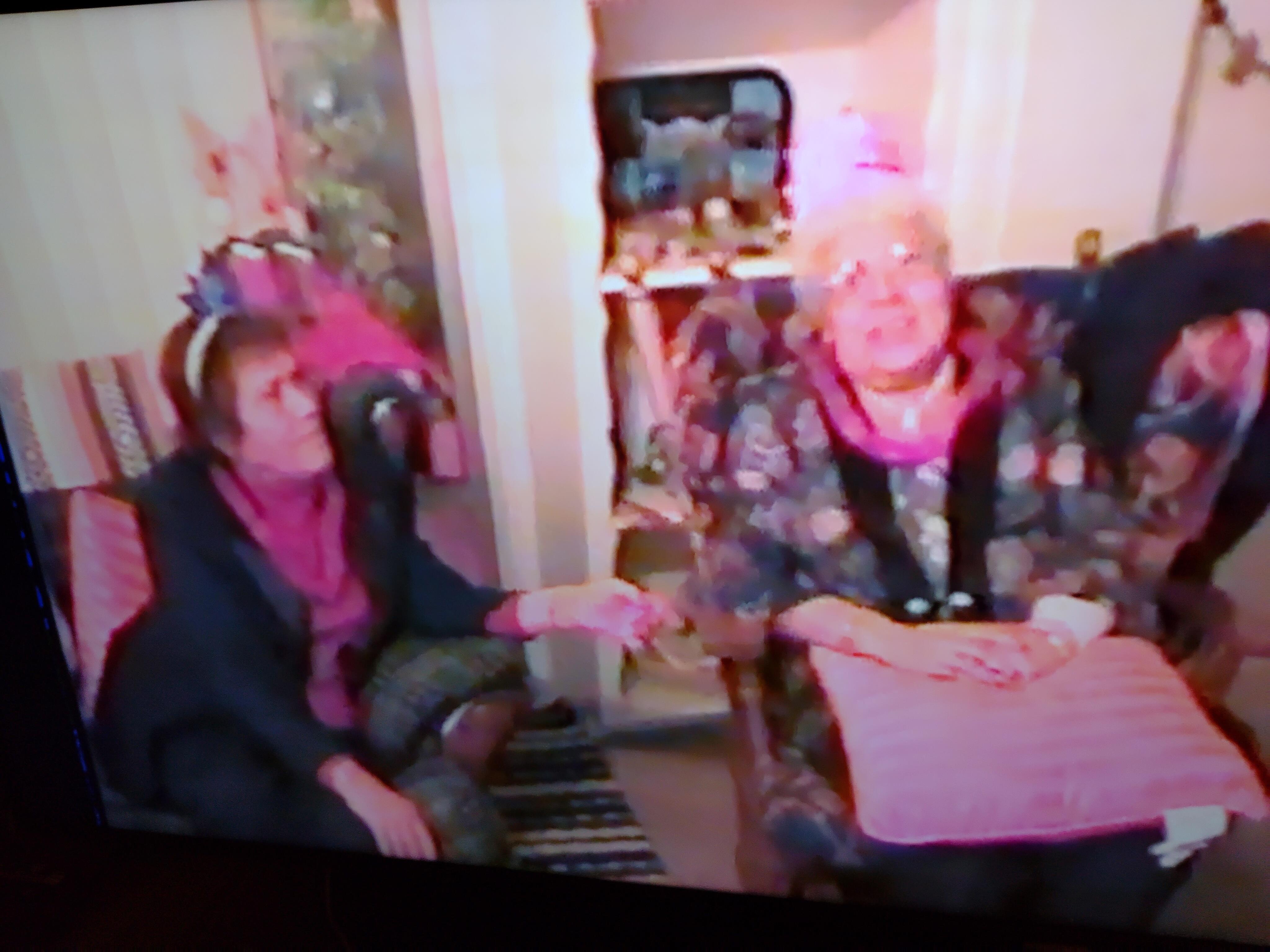 A group of women sitting in a chair