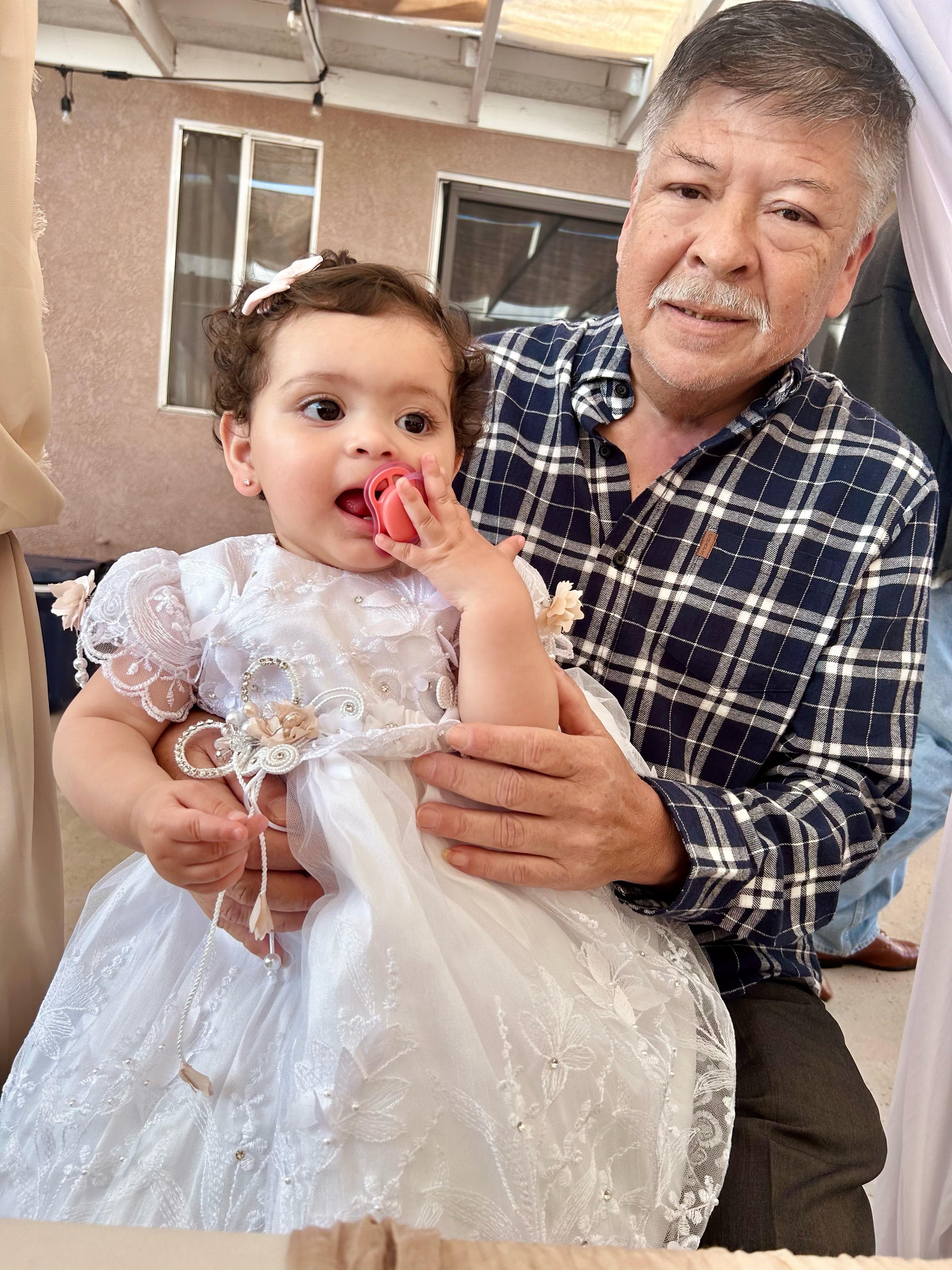 A man holding a baby