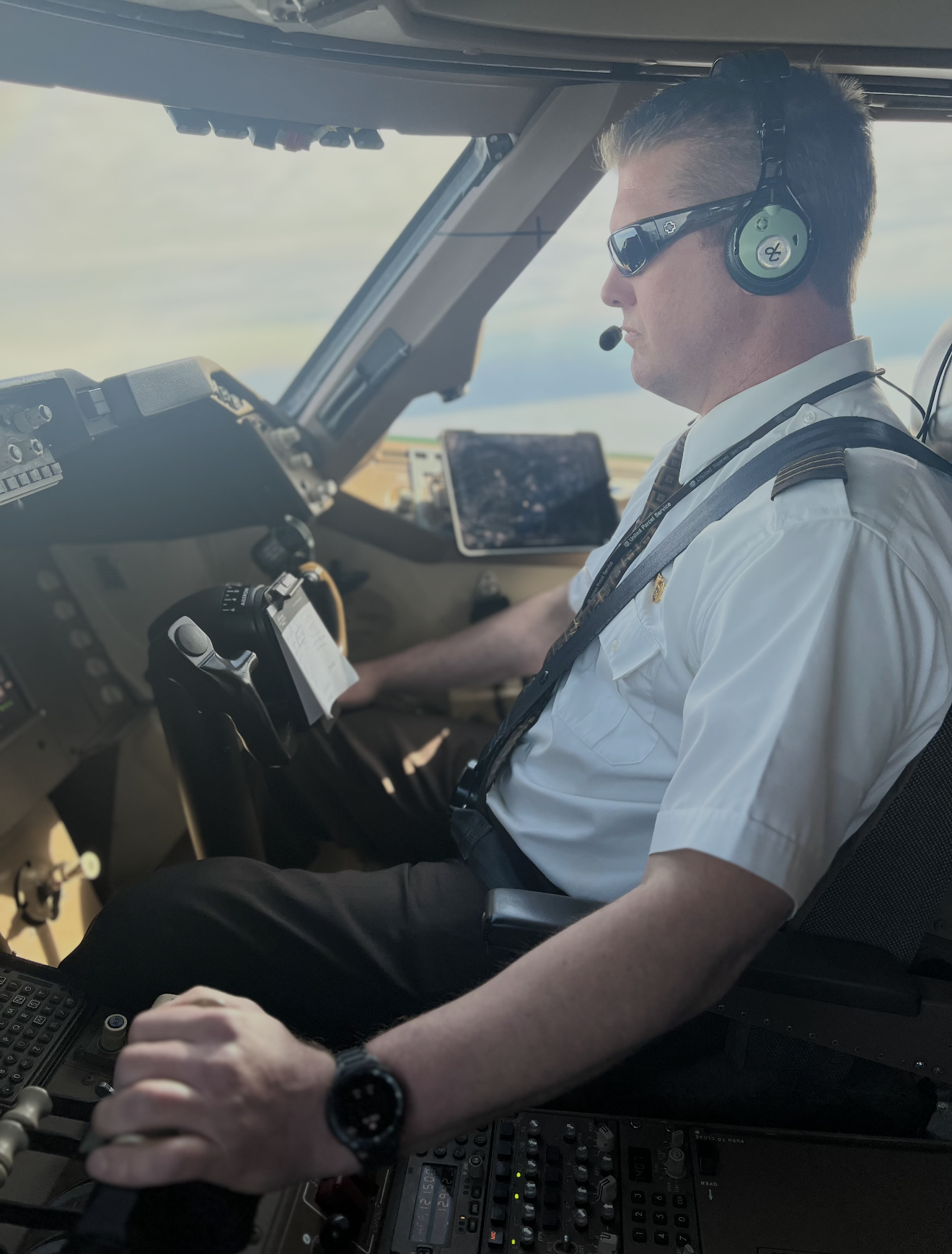 A man in a pilot's seat