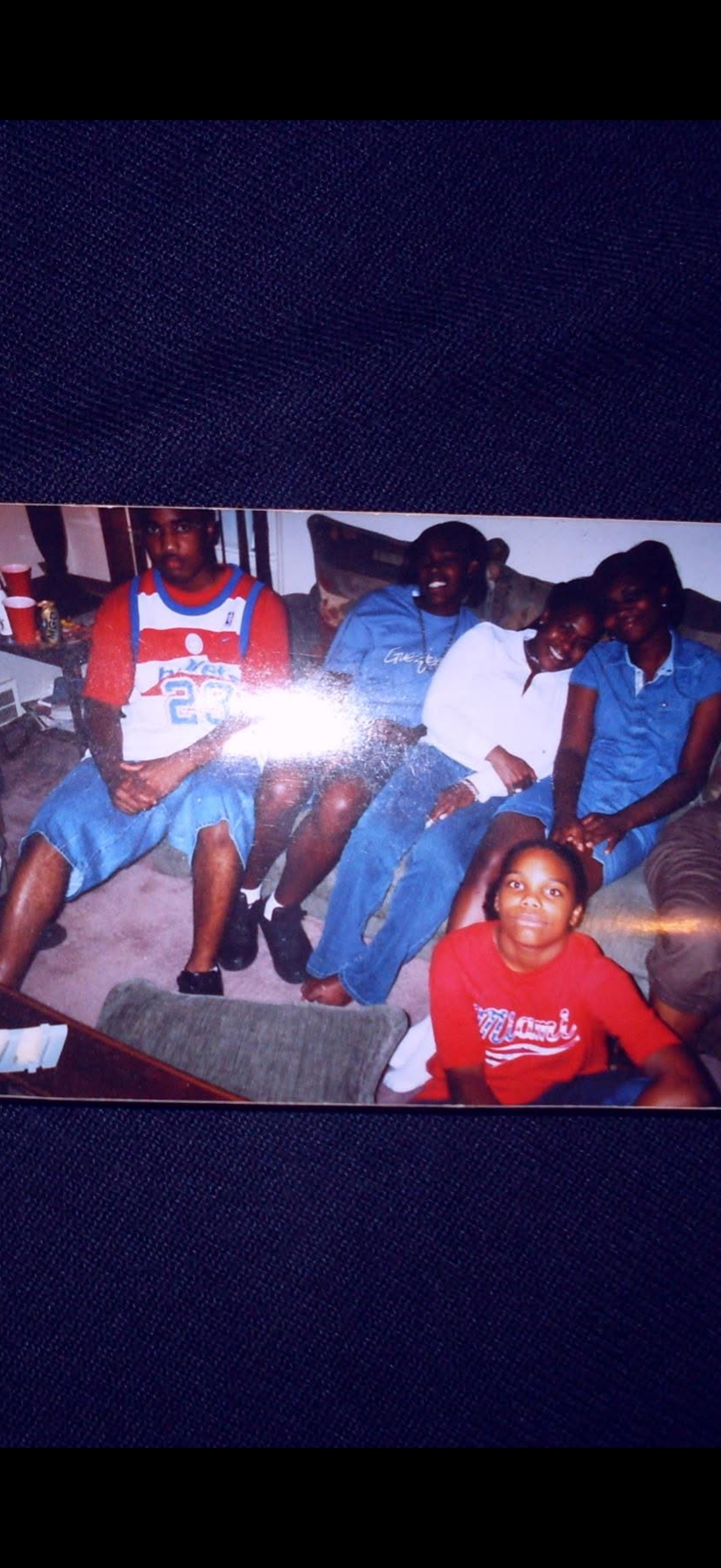 A group of people sitting on a couch