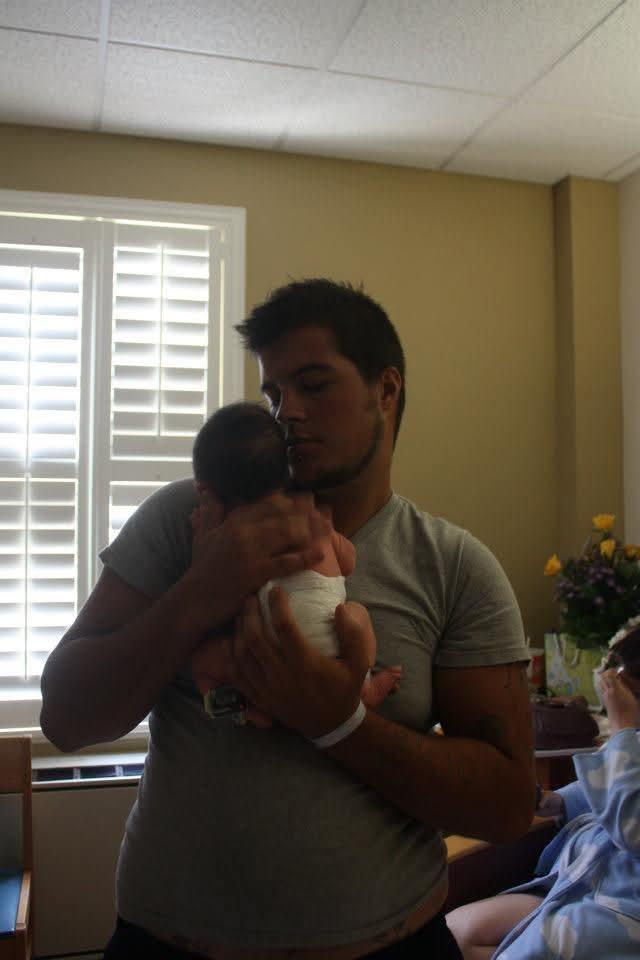 A man holding a baby