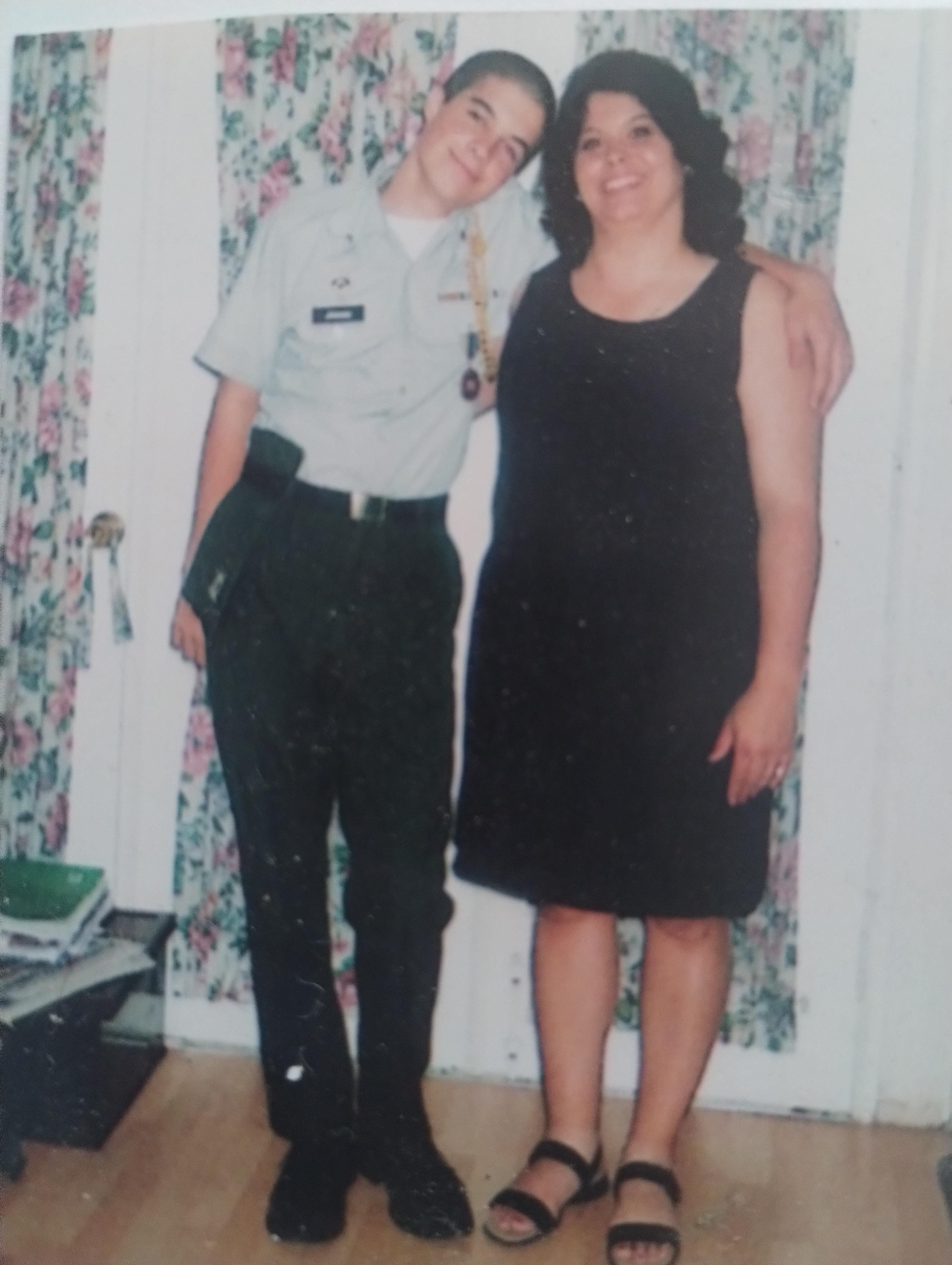 A man and woman posing for a picture
