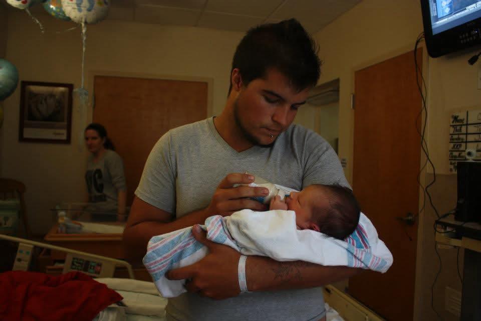 A man holding a baby
