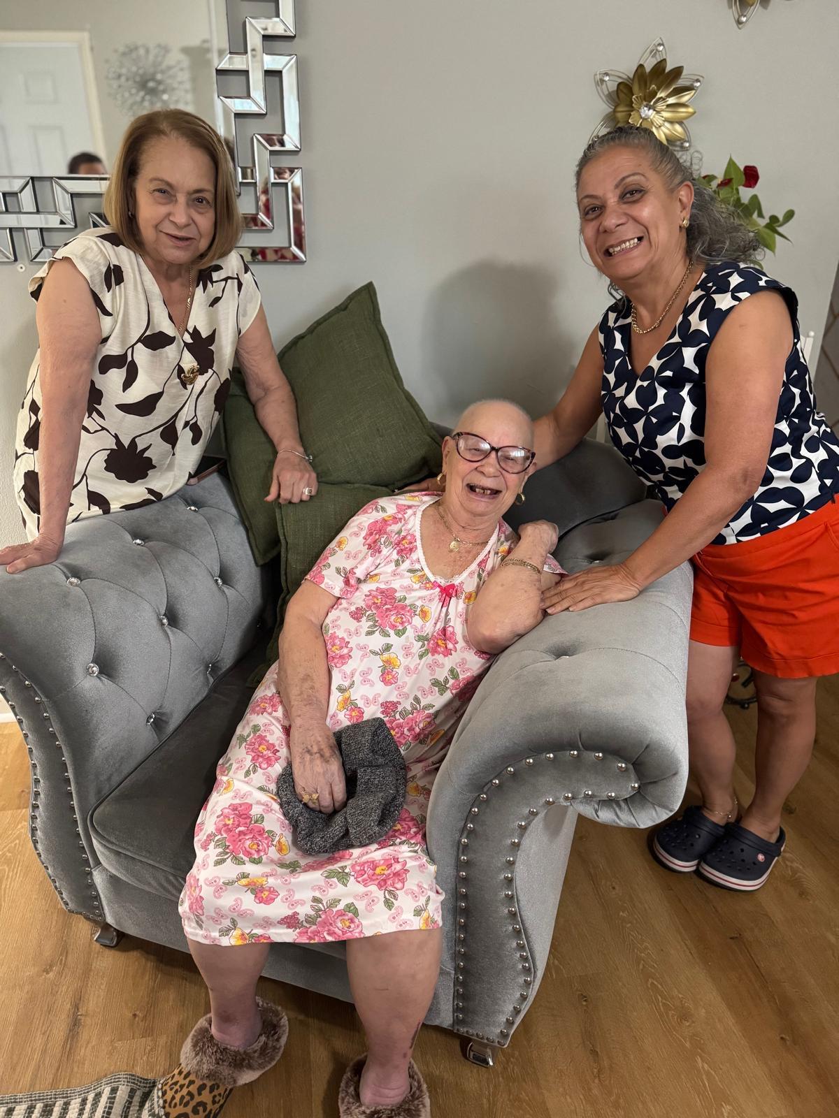 A group of women standing next to each other