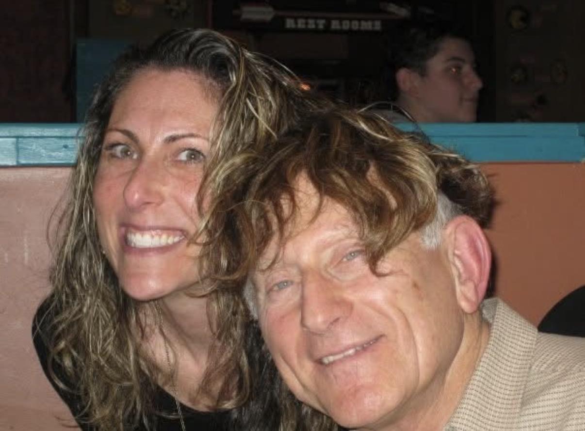 A man and woman smiling for a picture