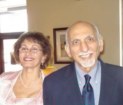 A man and woman smiling for a picture