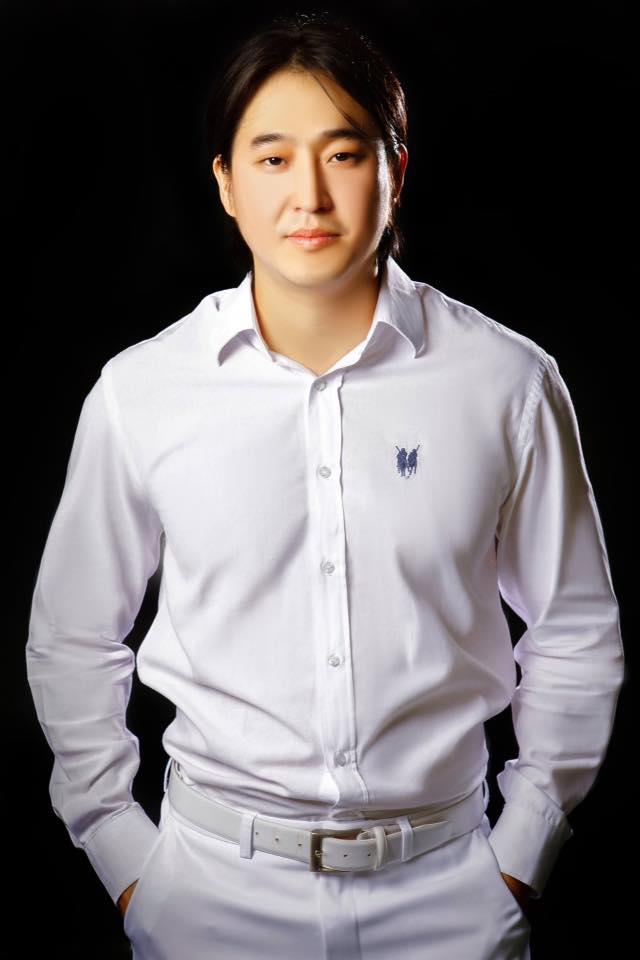 A man in a white shirt