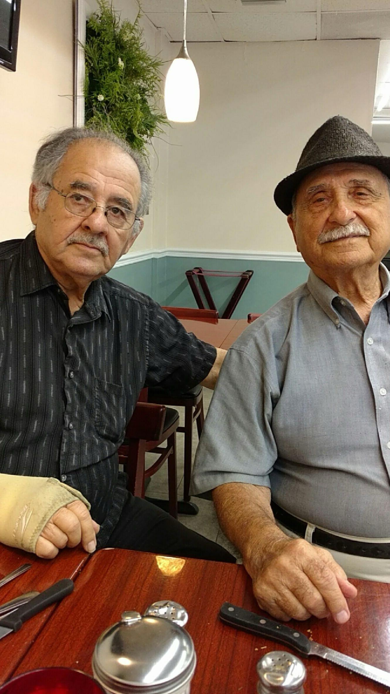 Two men sitting at a table