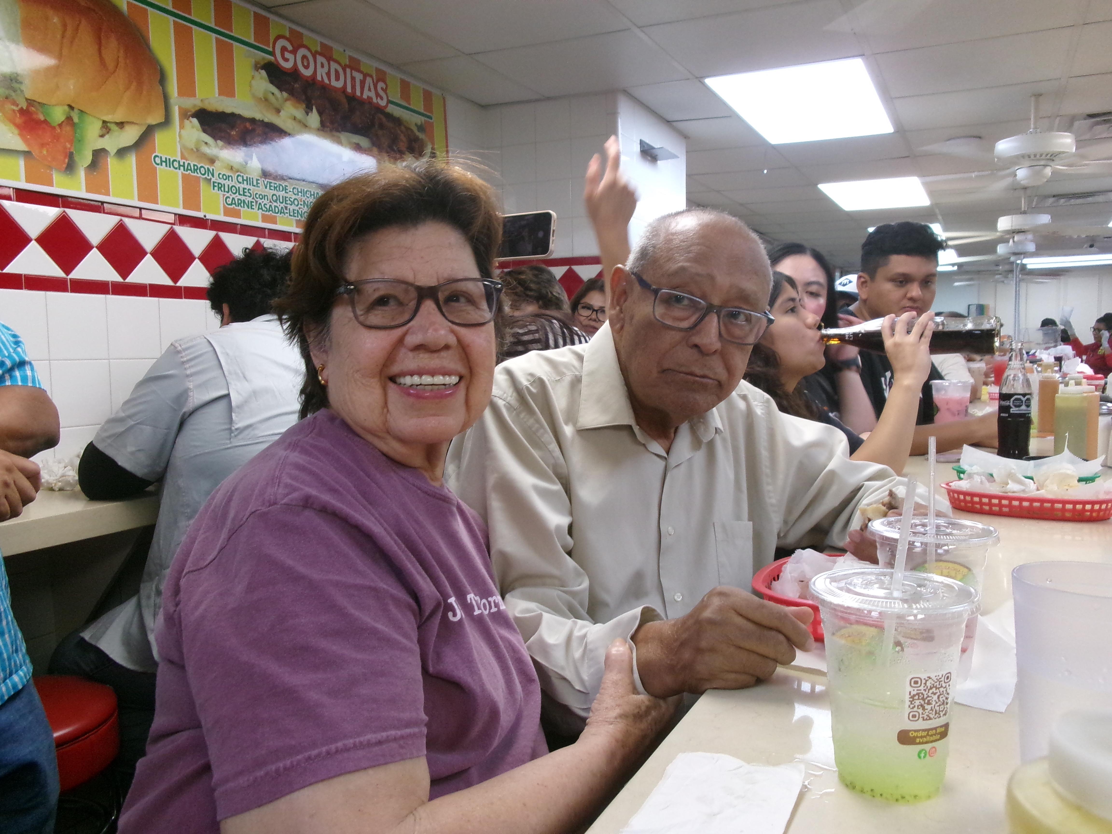 A group of people sitting at a table