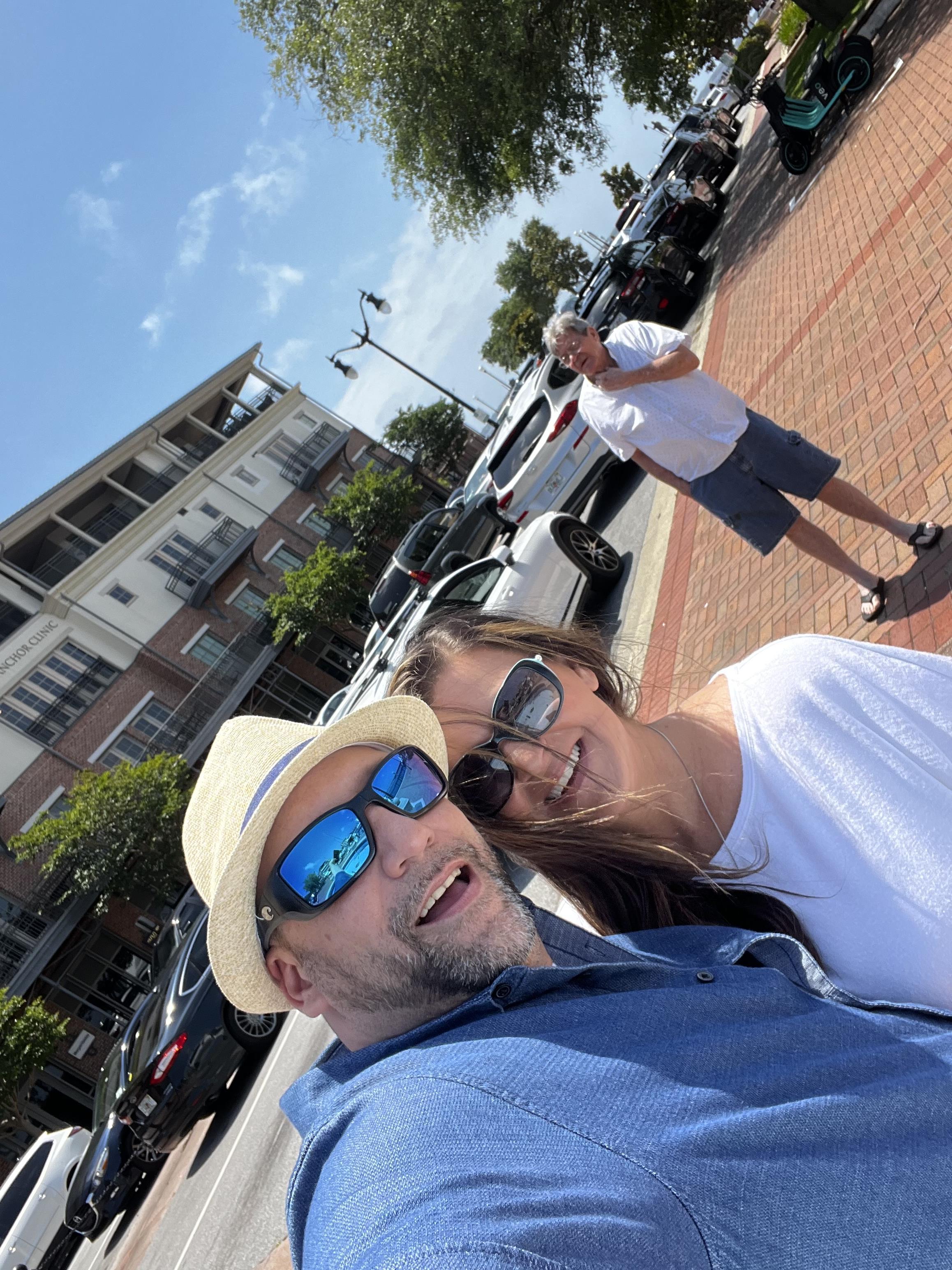 A man and woman taking a selfie