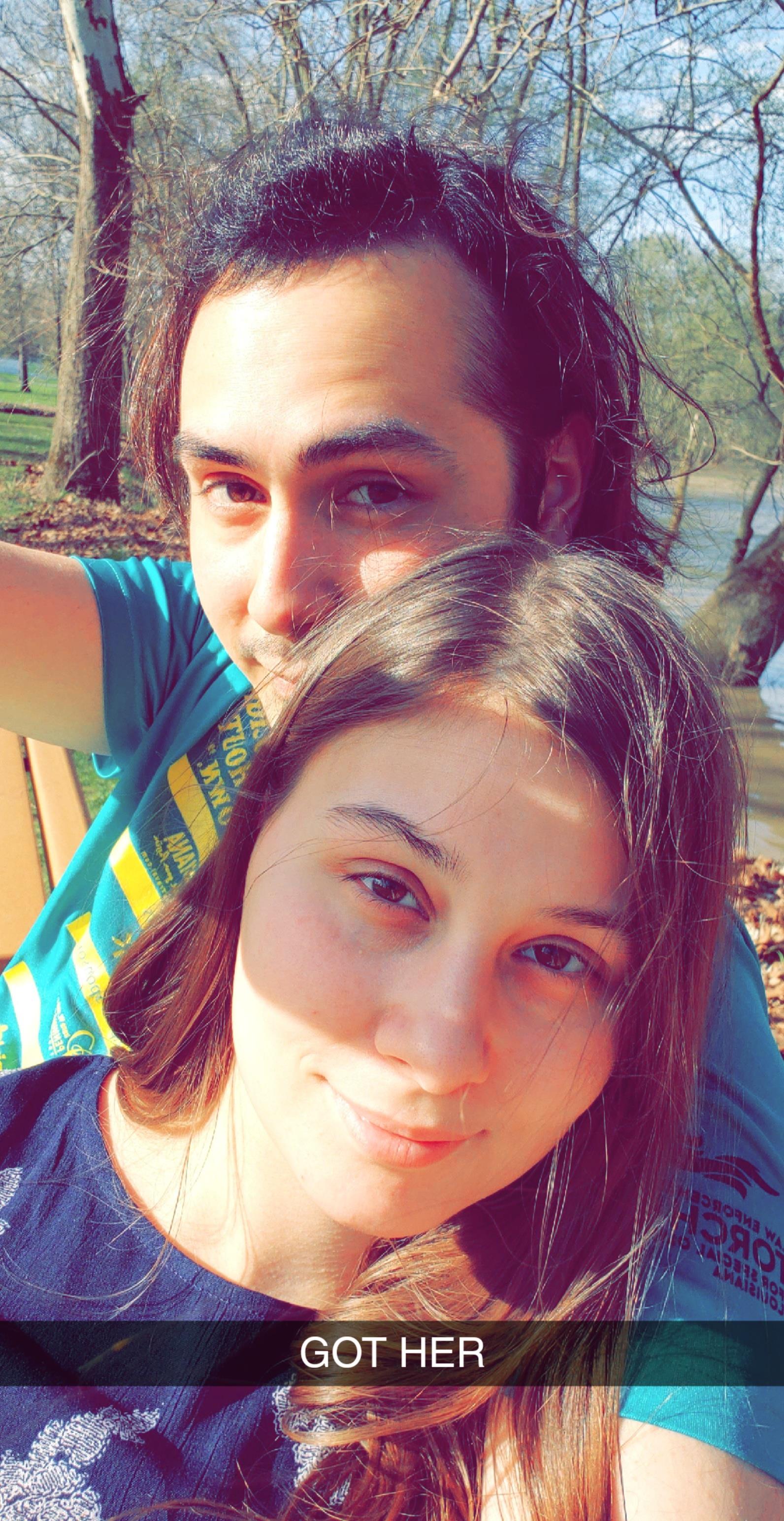 A man and woman taking a selfie