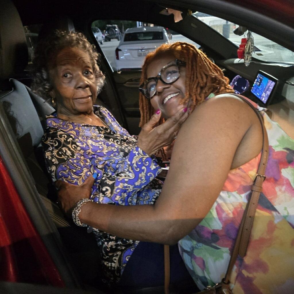 Two women sitting in a car