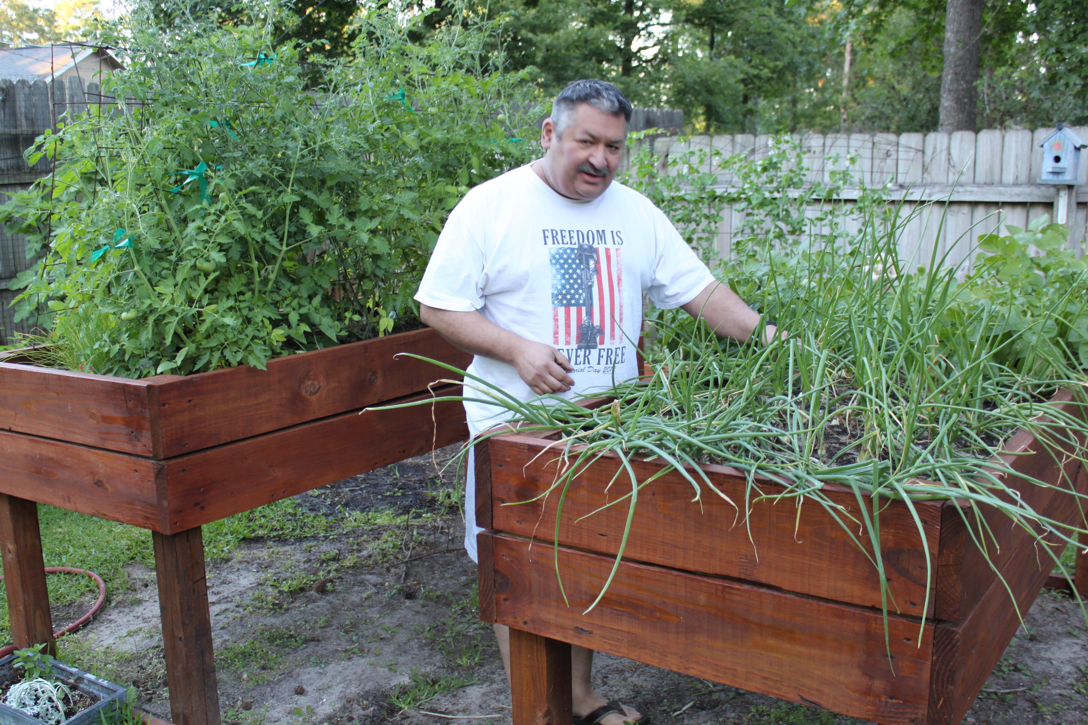 A man standing in a garden