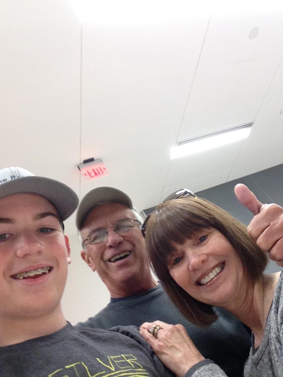 A group of people taking a selfie