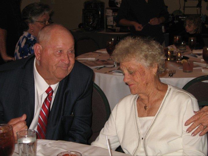 A man and woman sitting at a table