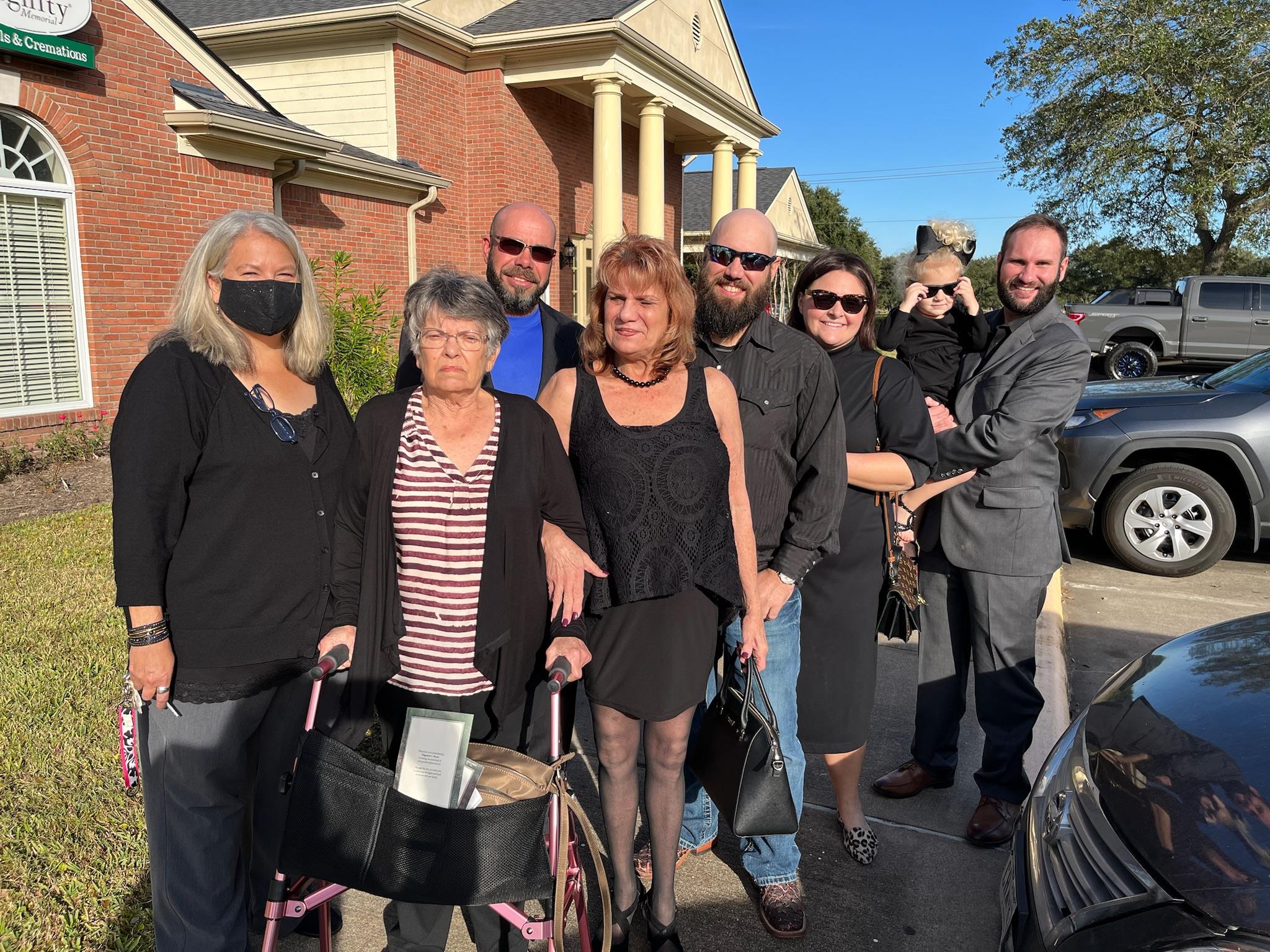 A group of people posing for a photo