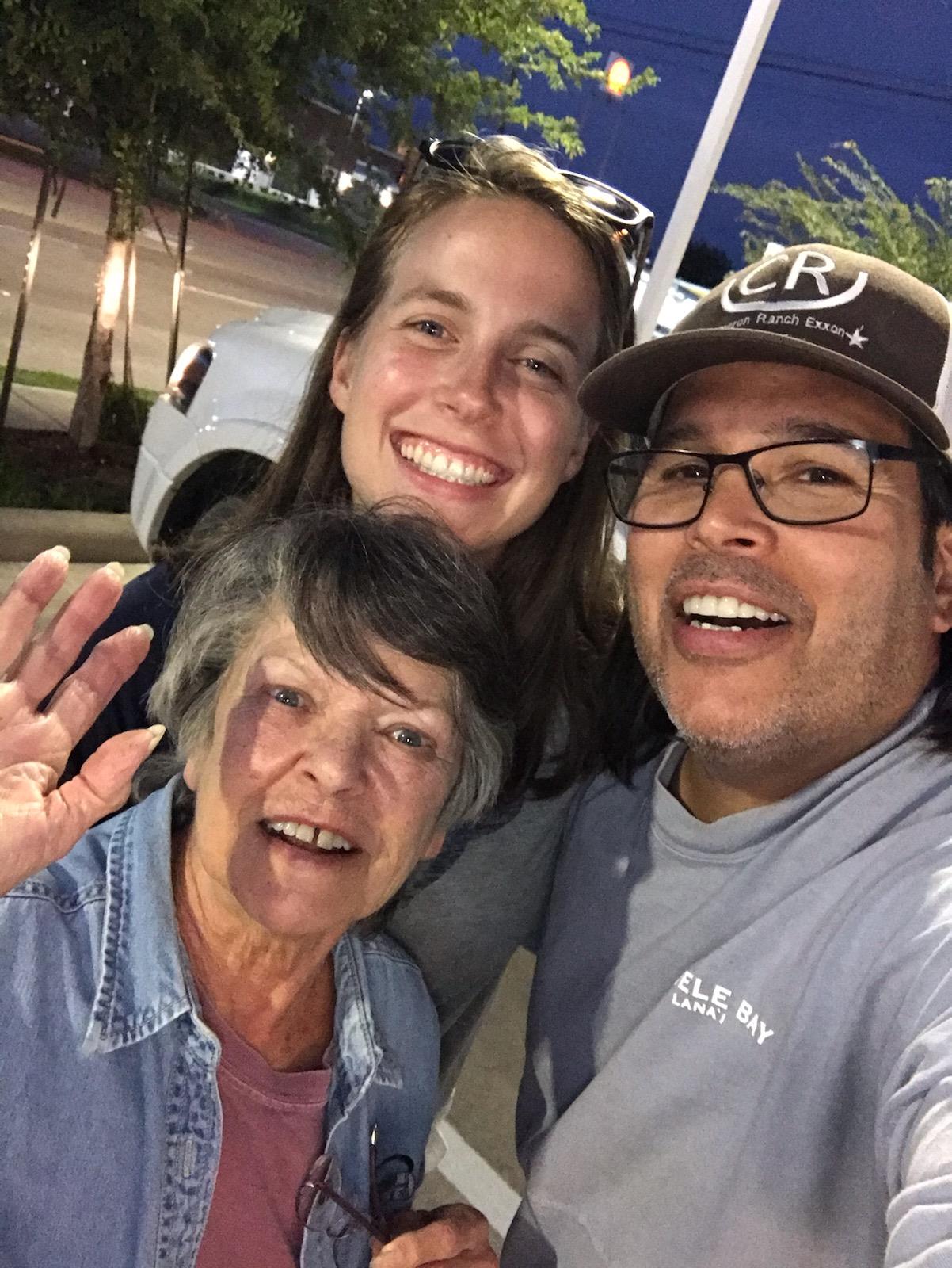A group of people posing for a selfie