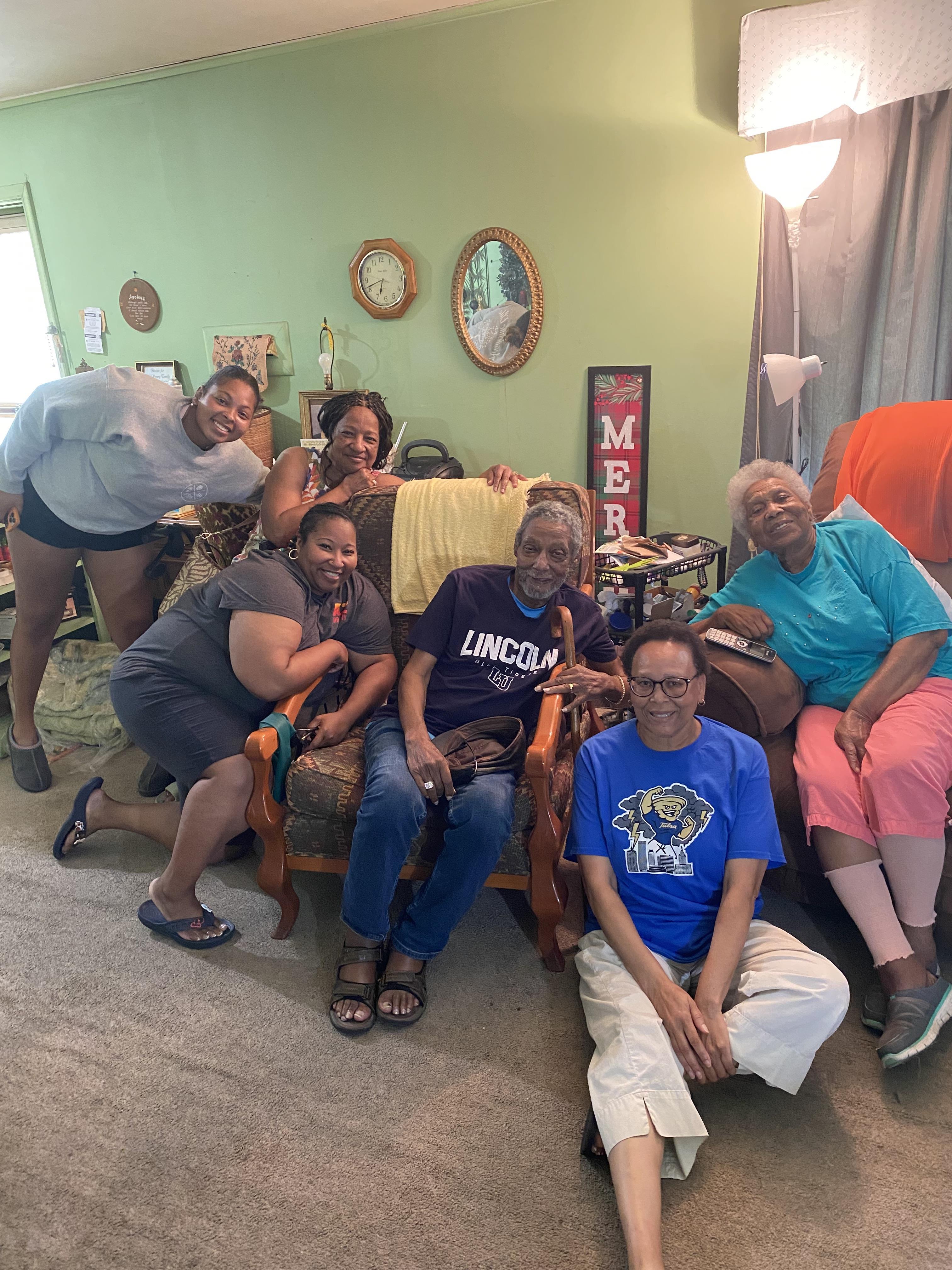 A group of people sitting in chairs