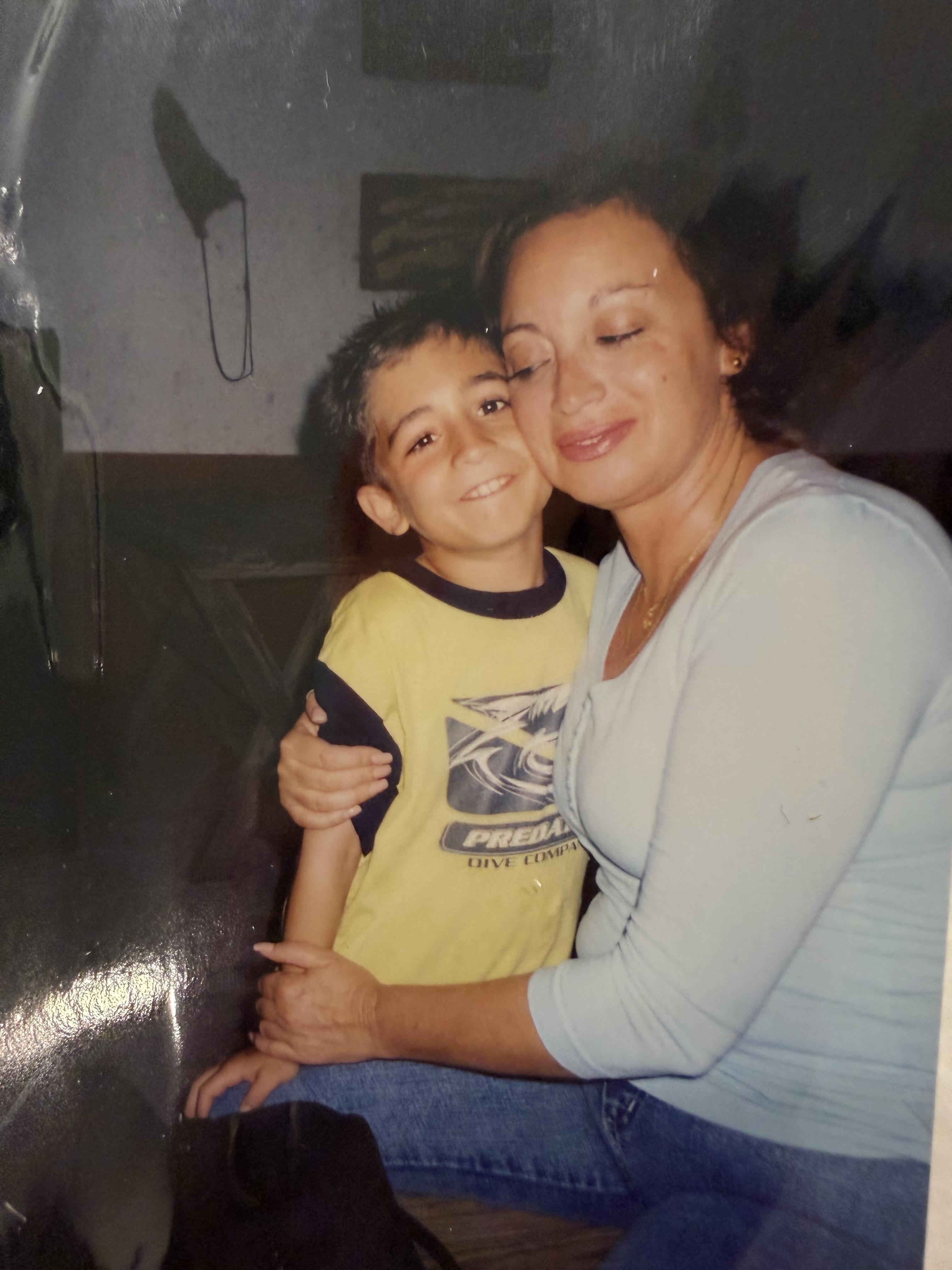 A woman and a boy sitting together