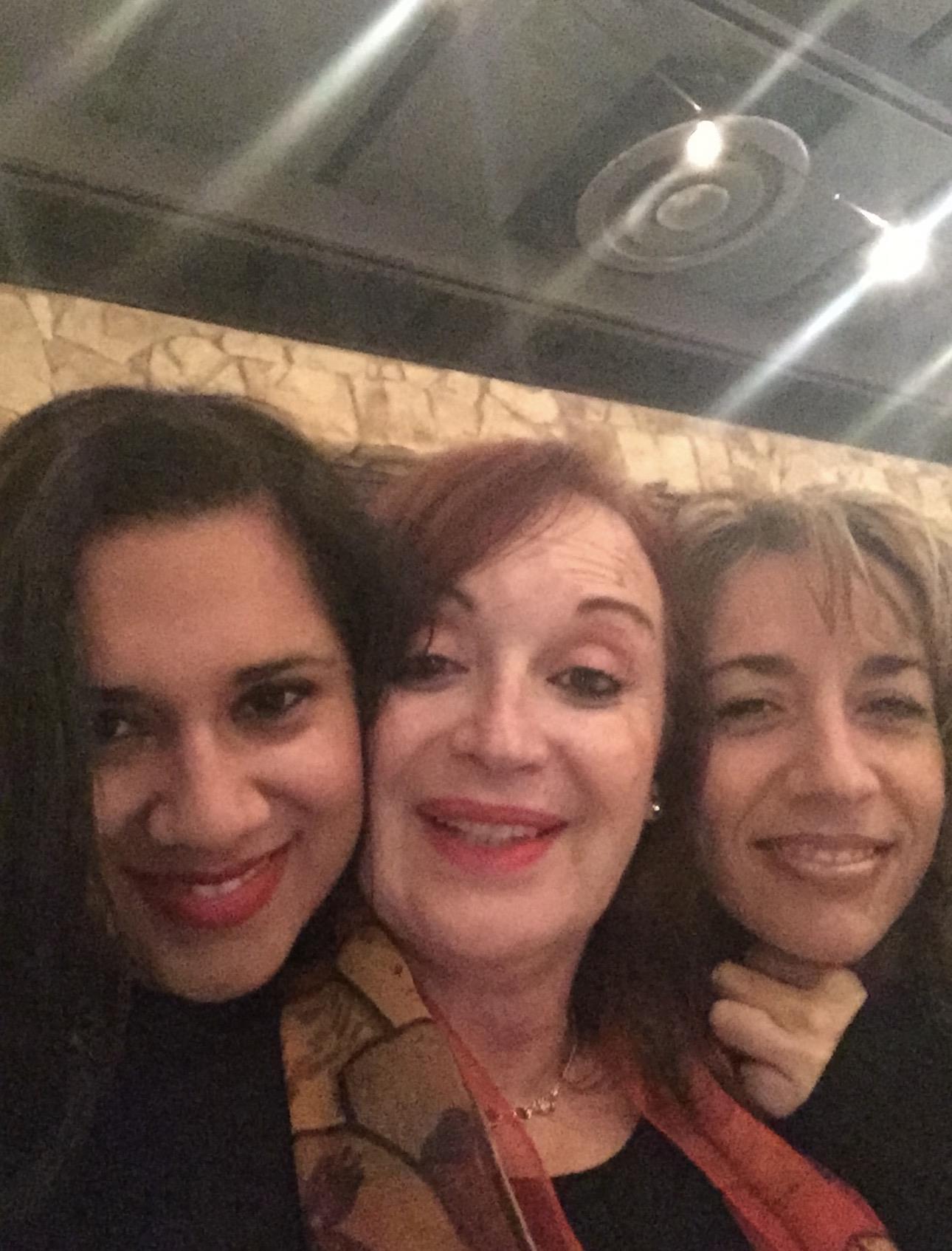 A group of women posing for a photo